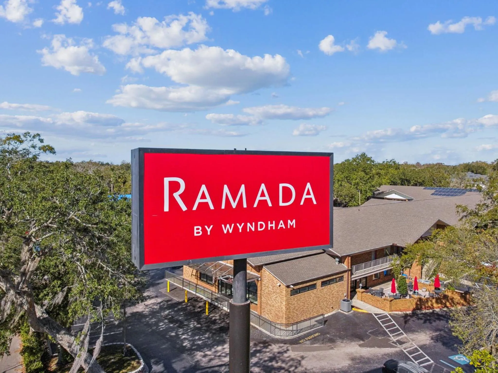 Property logo or sign in Ramada by Wyndham Temple Terrace/Tampa North