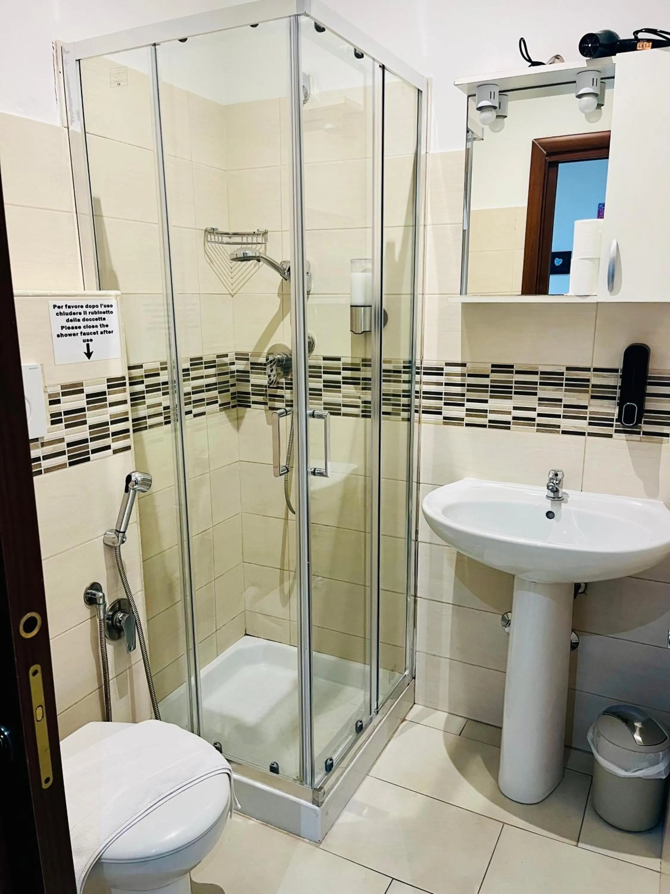 Toilet in ImeraRooms