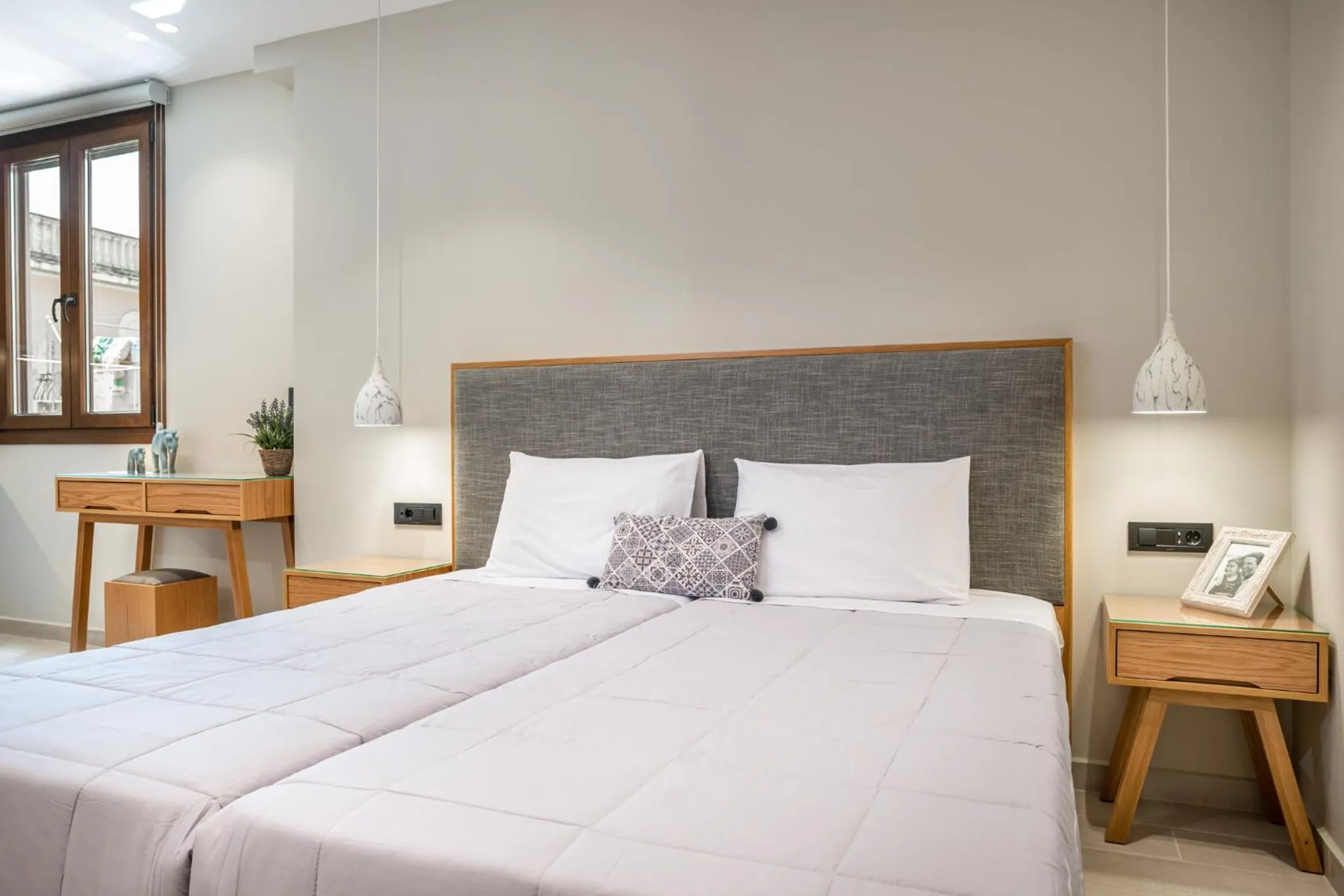 Bed in Alektor Luxury Apartments