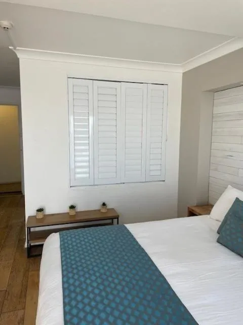 Bed in Ocean Front Motel