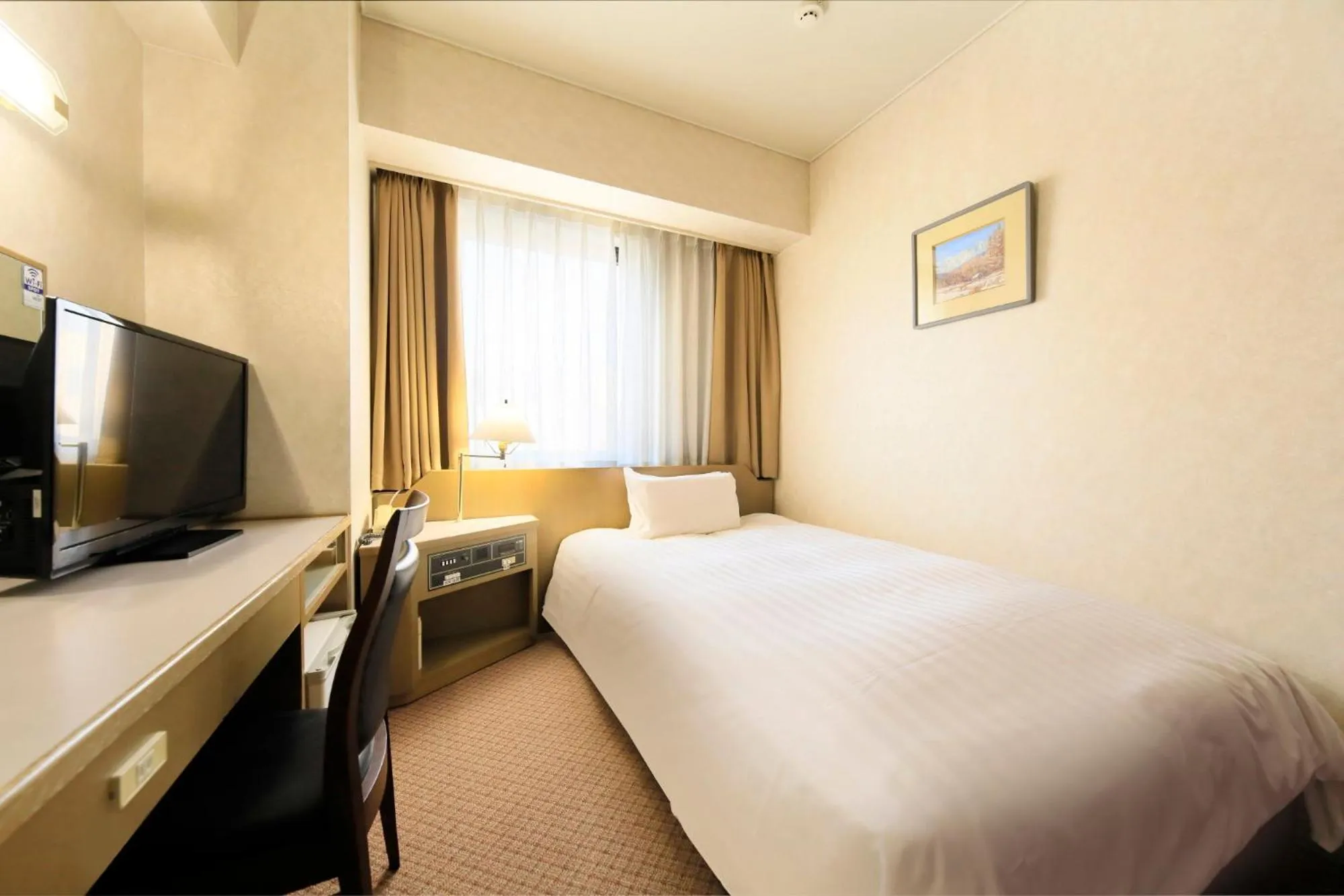 Bed in Hotel Nagano Avenue