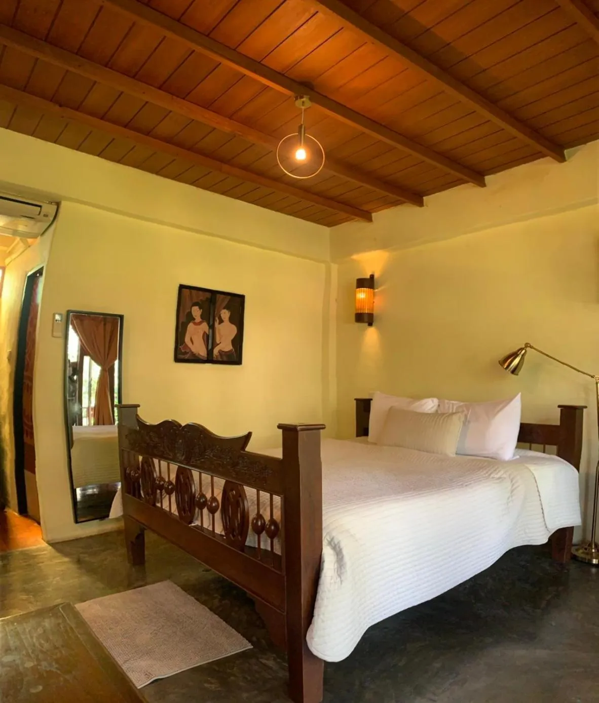 Bed in Pai Vimaan Resort