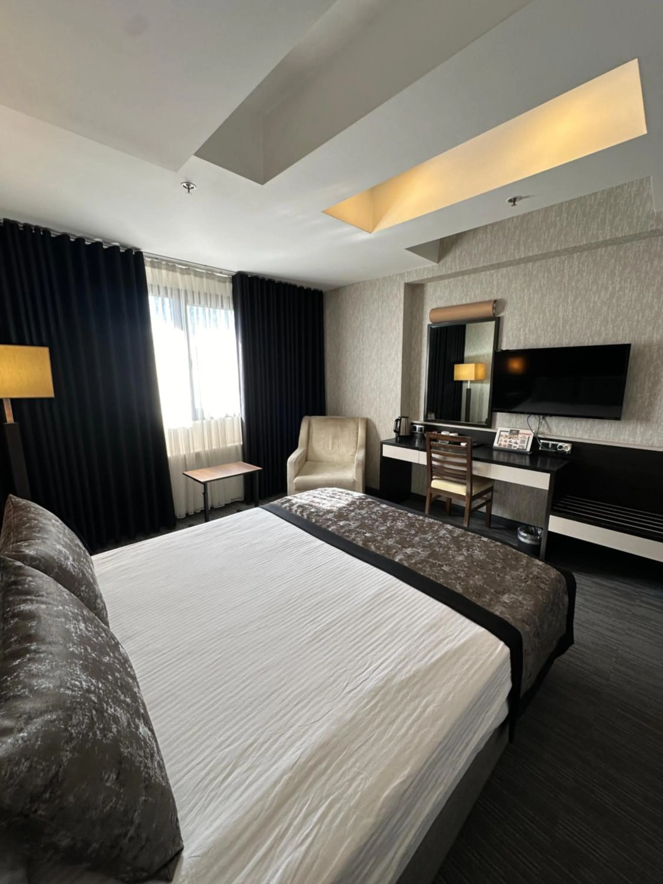 Bed in Grand Denizli Hotel