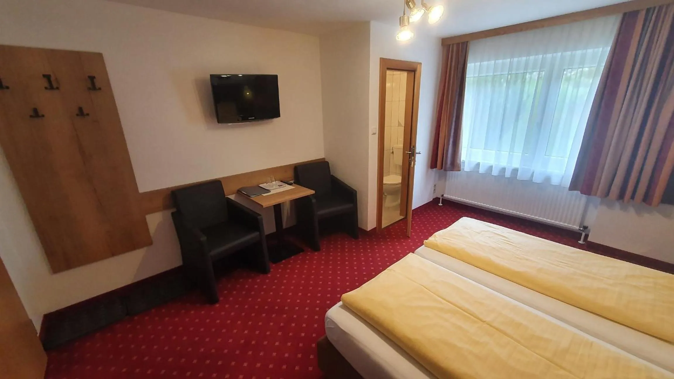 Photo of the whole room, Bed in Hotel Garni Dorfblick