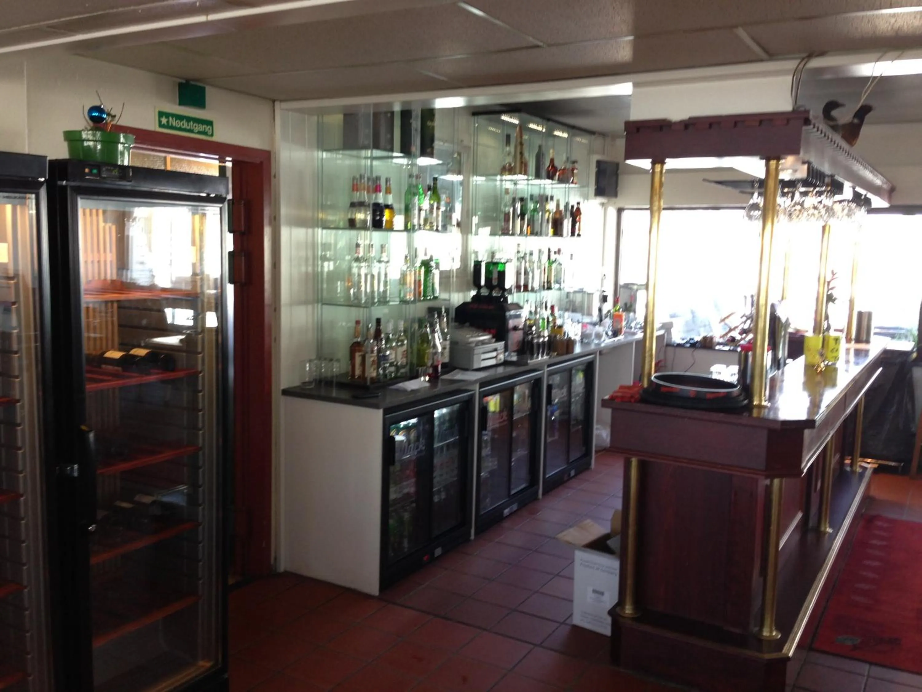 Lounge or bar in Sørreisa Hotell