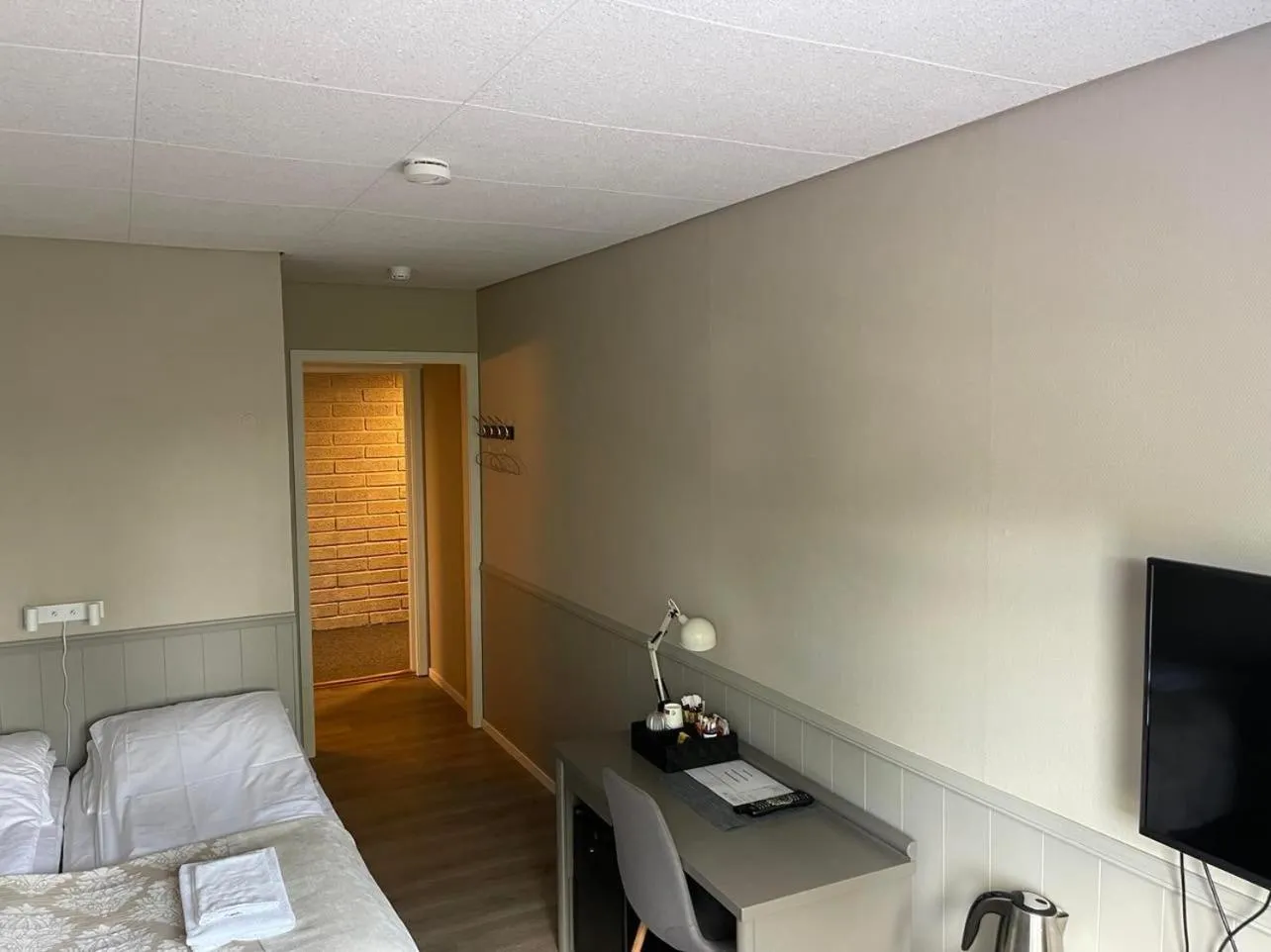 Bed in Sørreisa Hotell