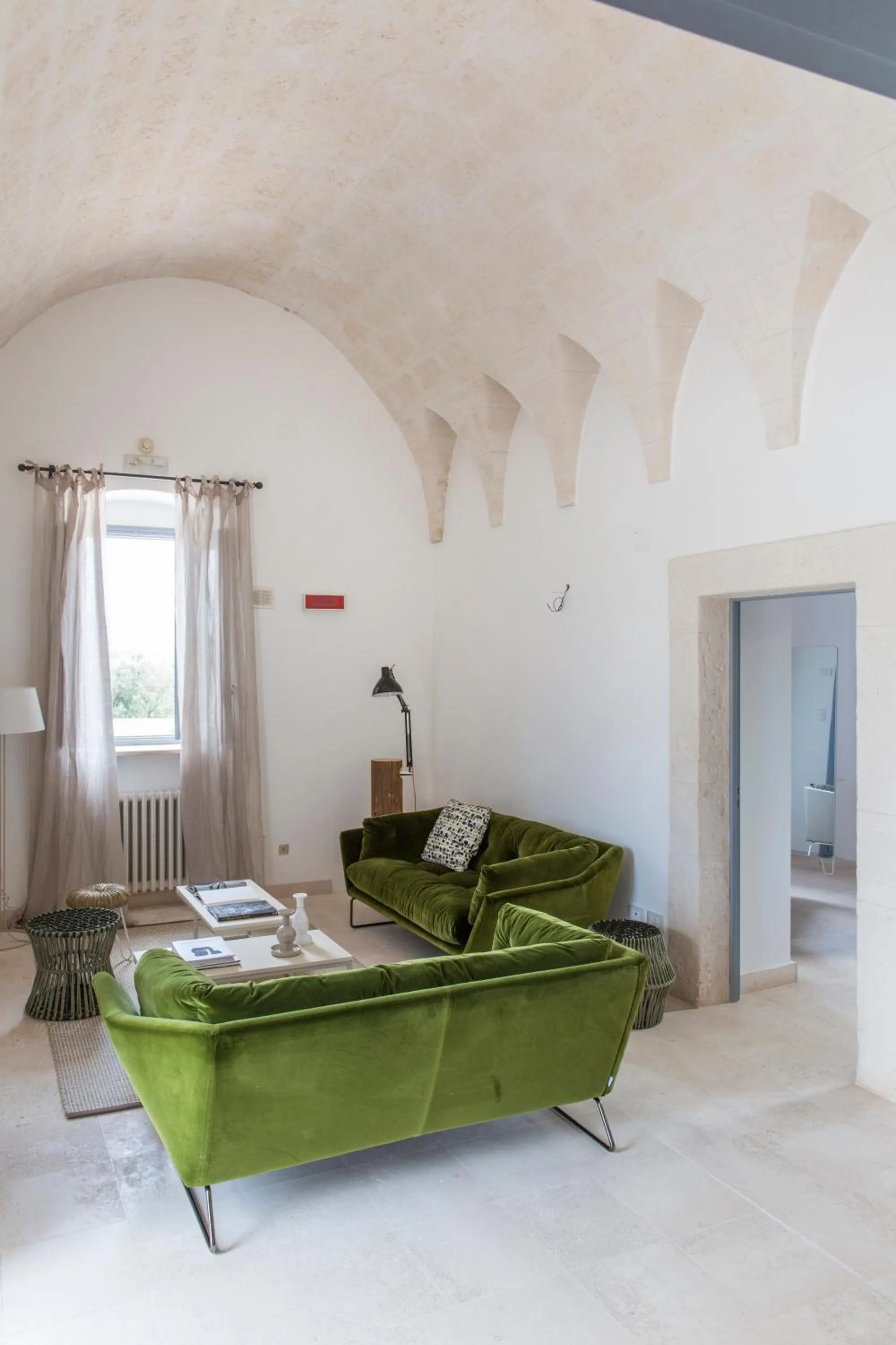 Communal lounge/ TV room in Masseria San Giovanni - Epoca Collection