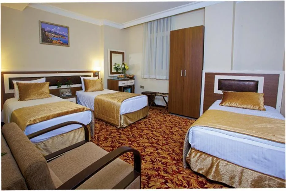 Bed in Grand Anatolia Hotel