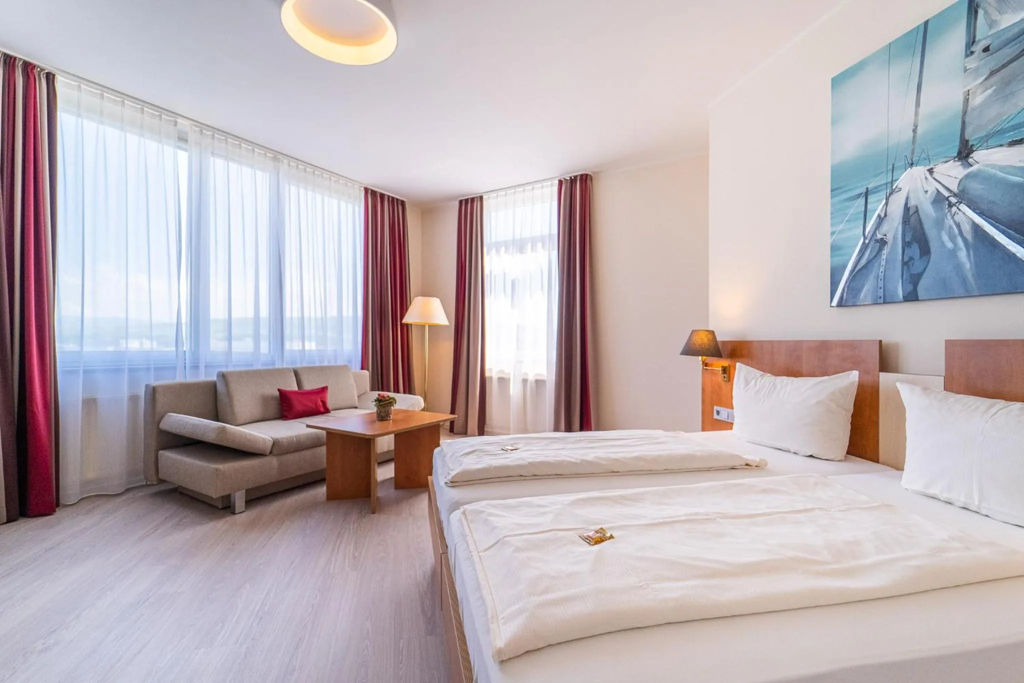 Photo of the whole room, Bed in Best Western Hotel Dreiländerbrücke Weil am Rhein / Basel