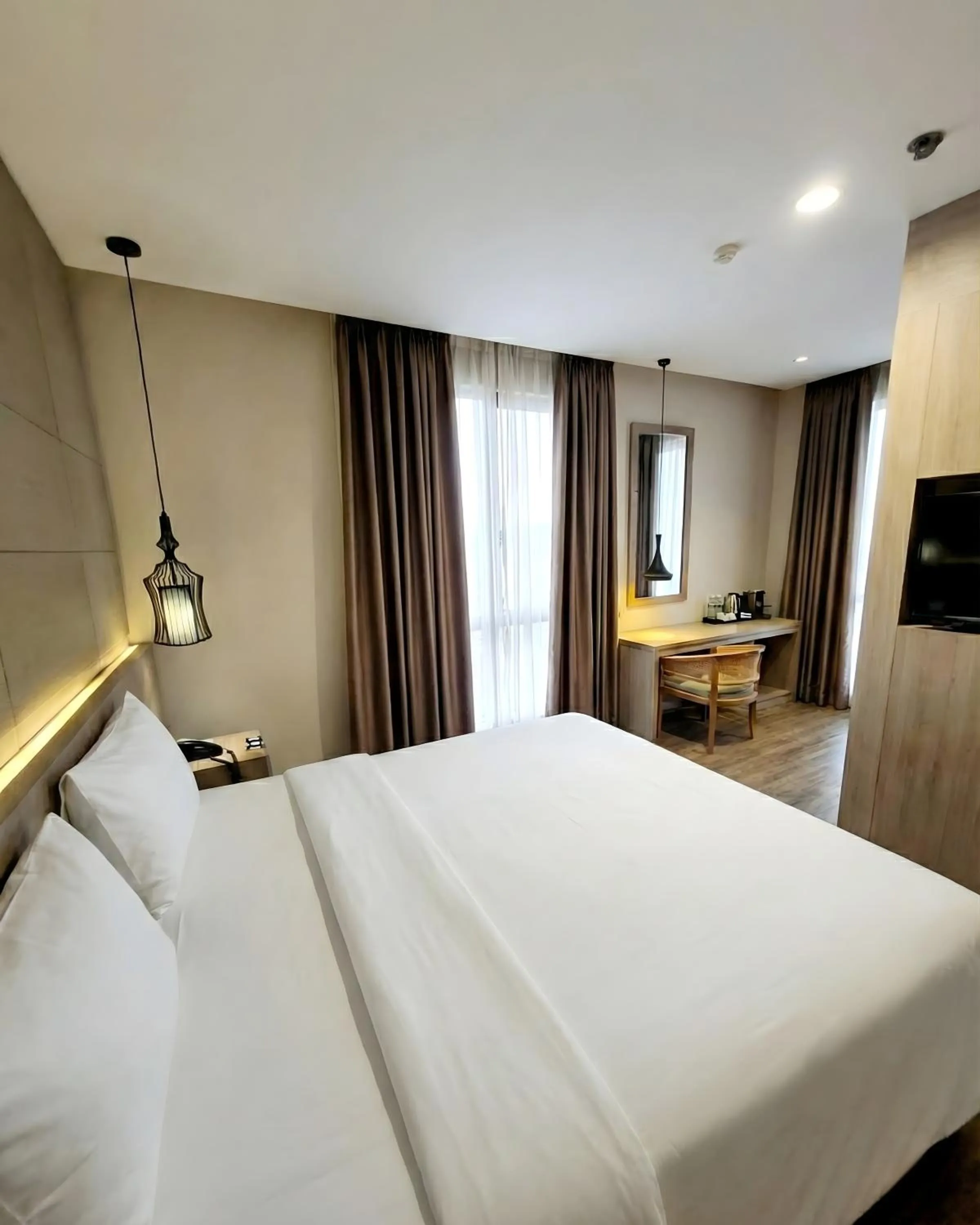 Bedroom, Bed in Rivoli Hotel Jakarta