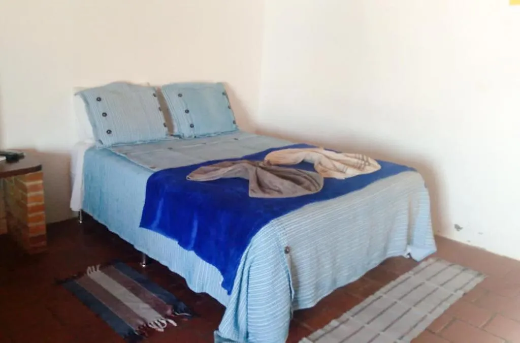Bed in Pousada Brésil Aventure