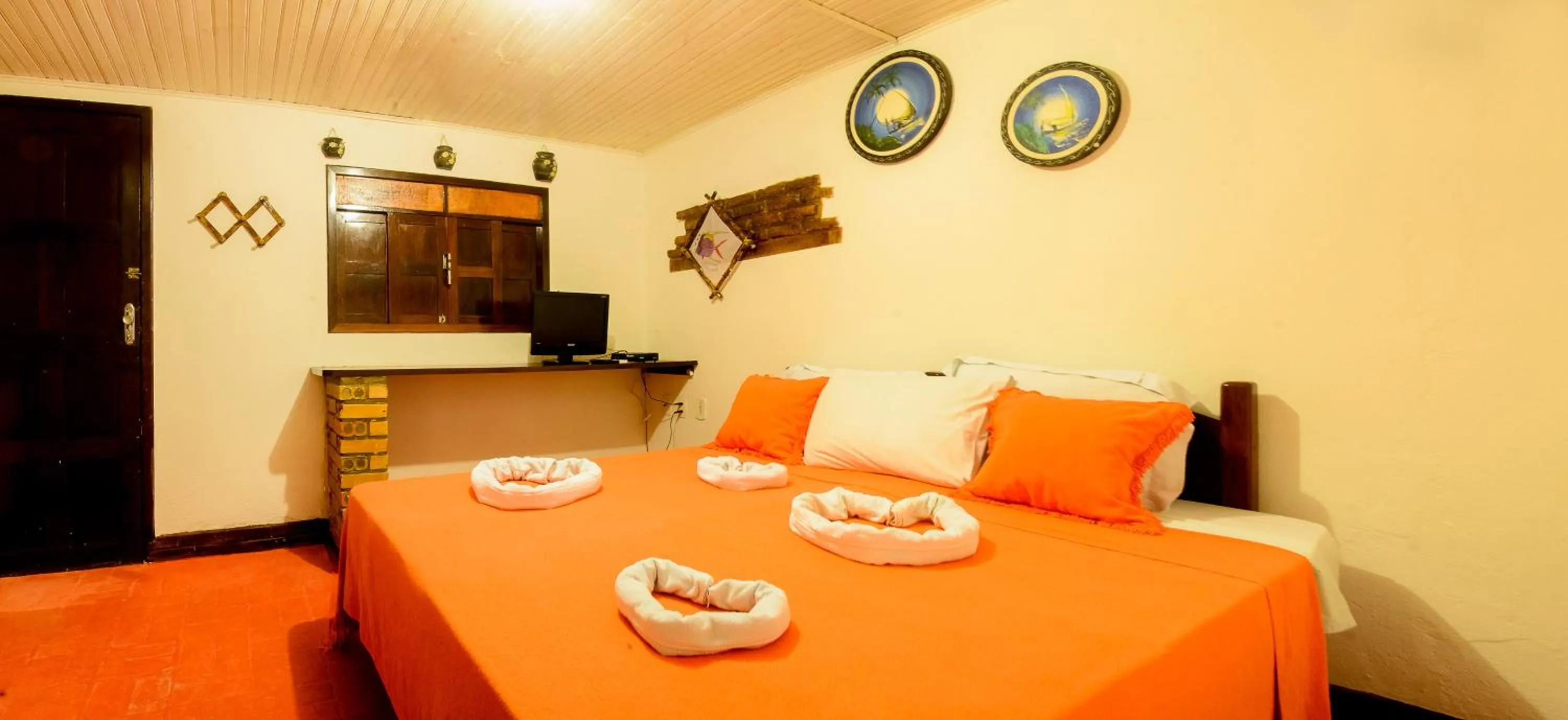 Bed in Pousada Brésil Aventure