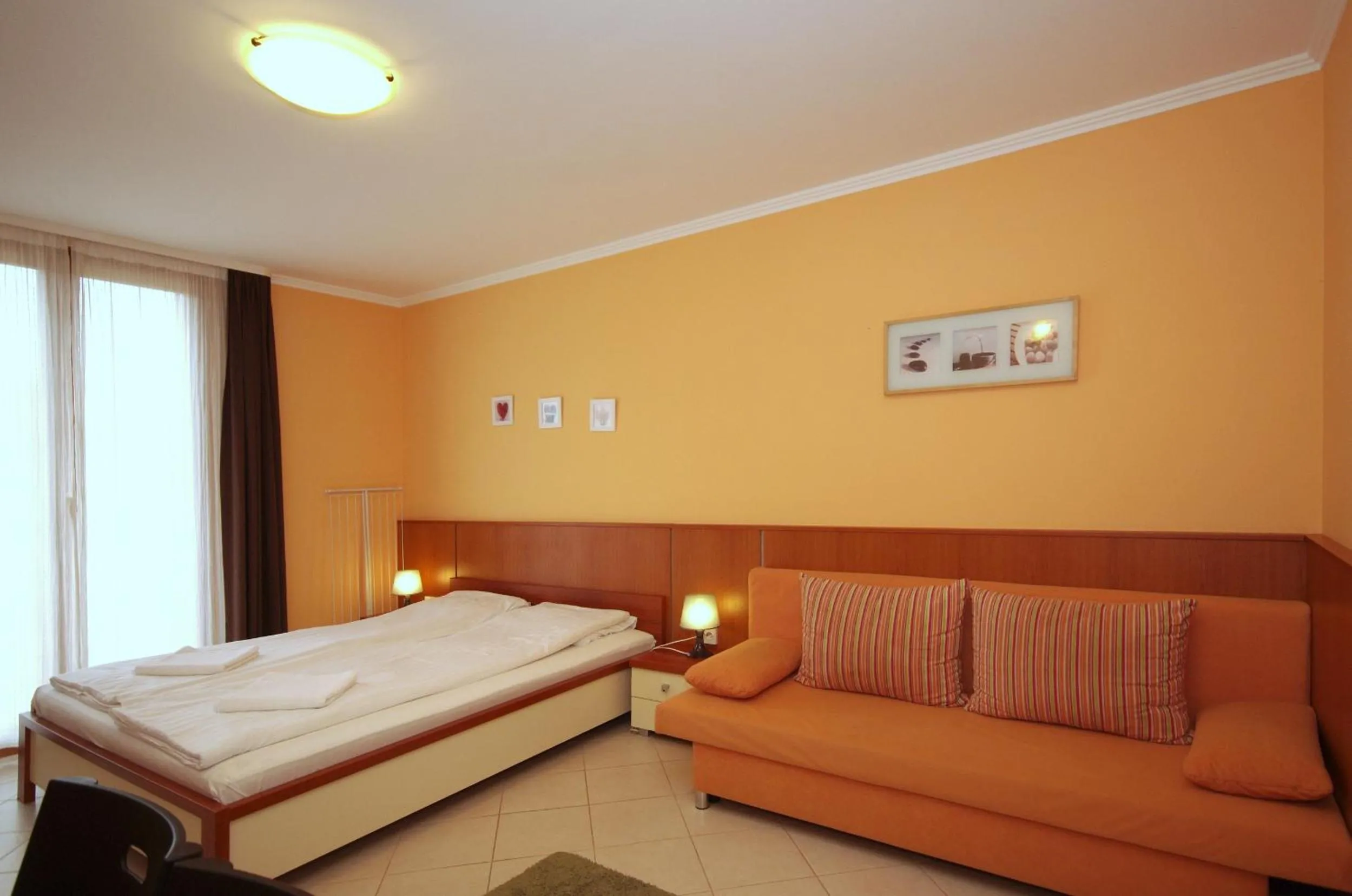 Bed in Várárok Apartman