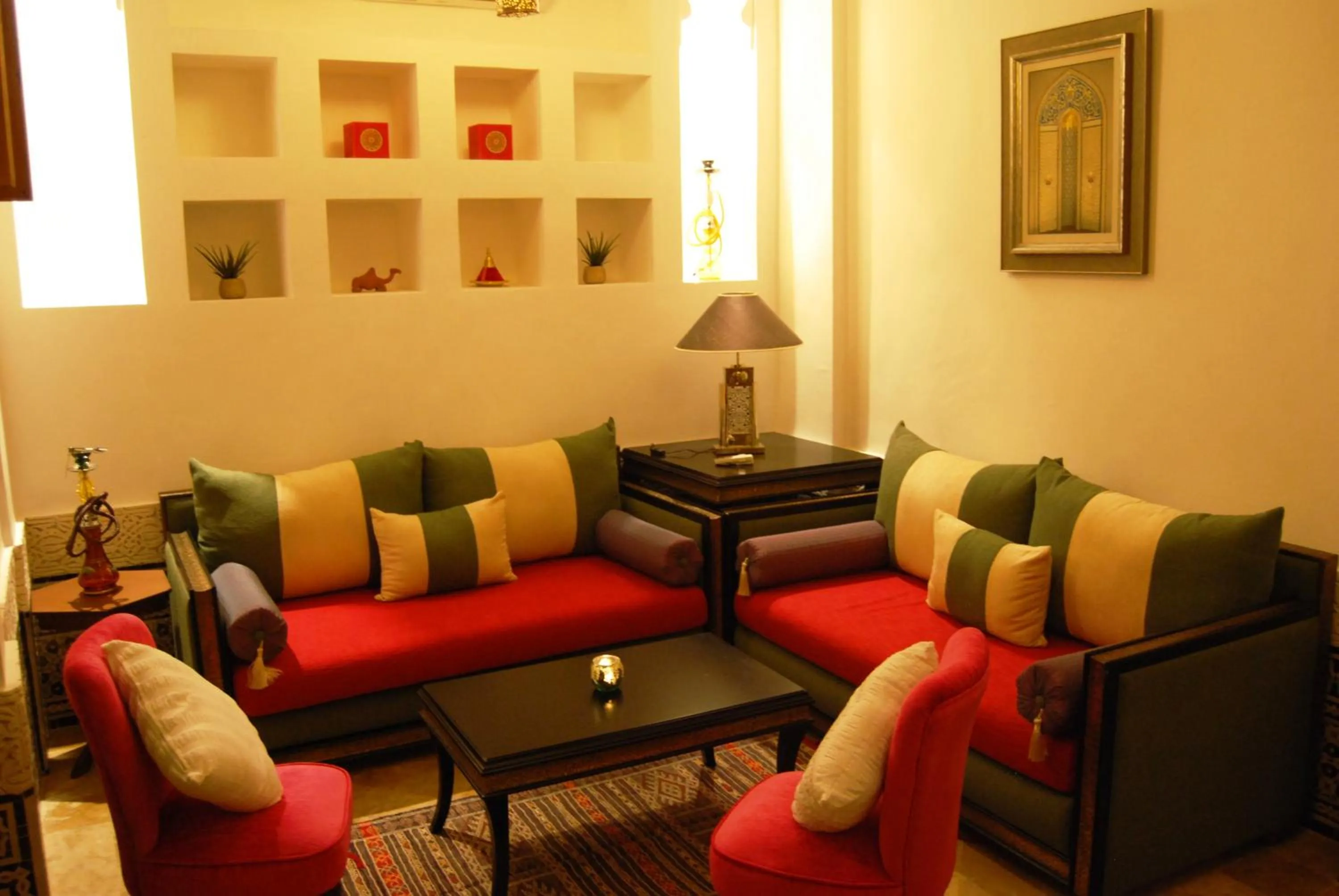 Communal lounge/ TV room in Riad Viva