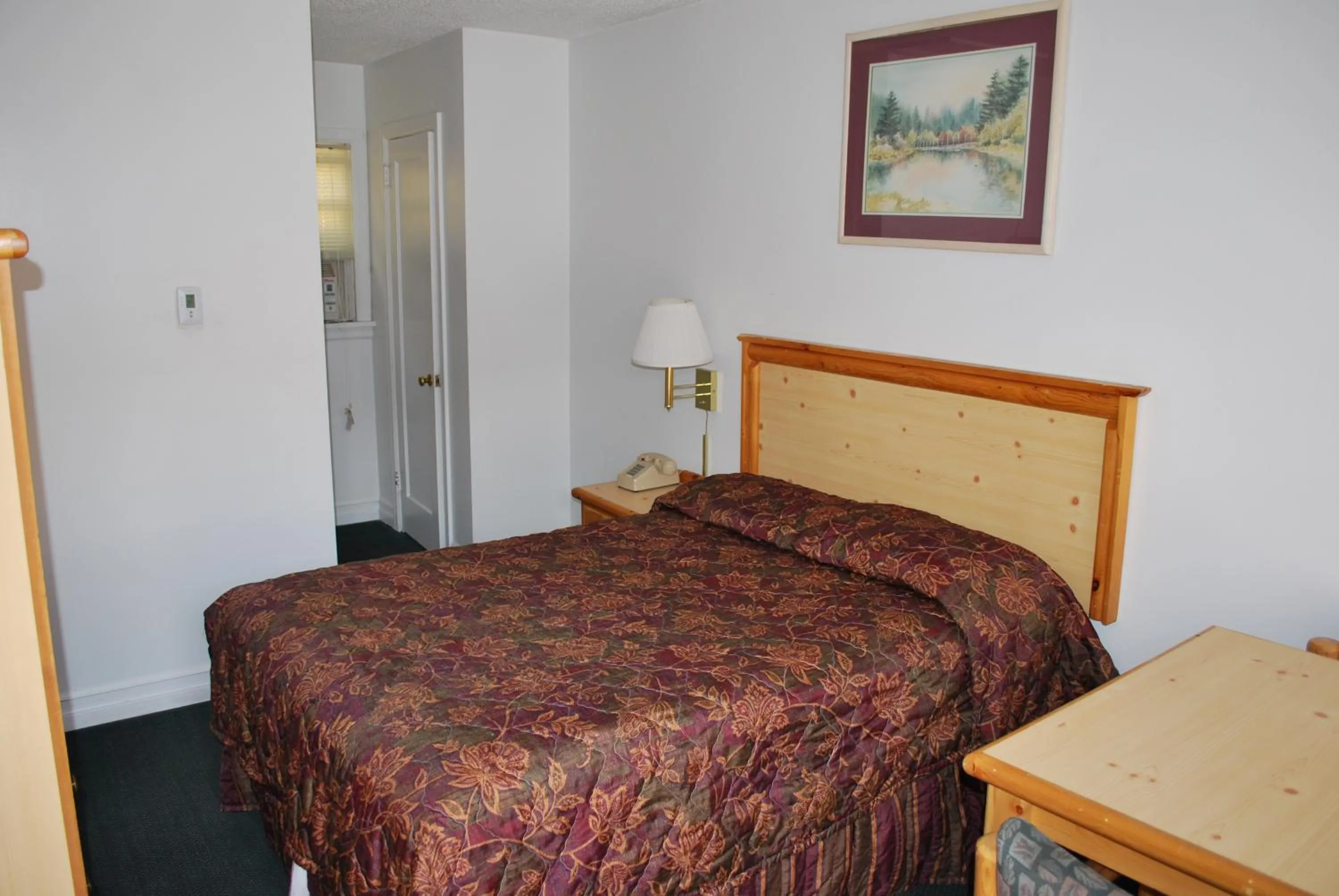 Bed in Central Motel