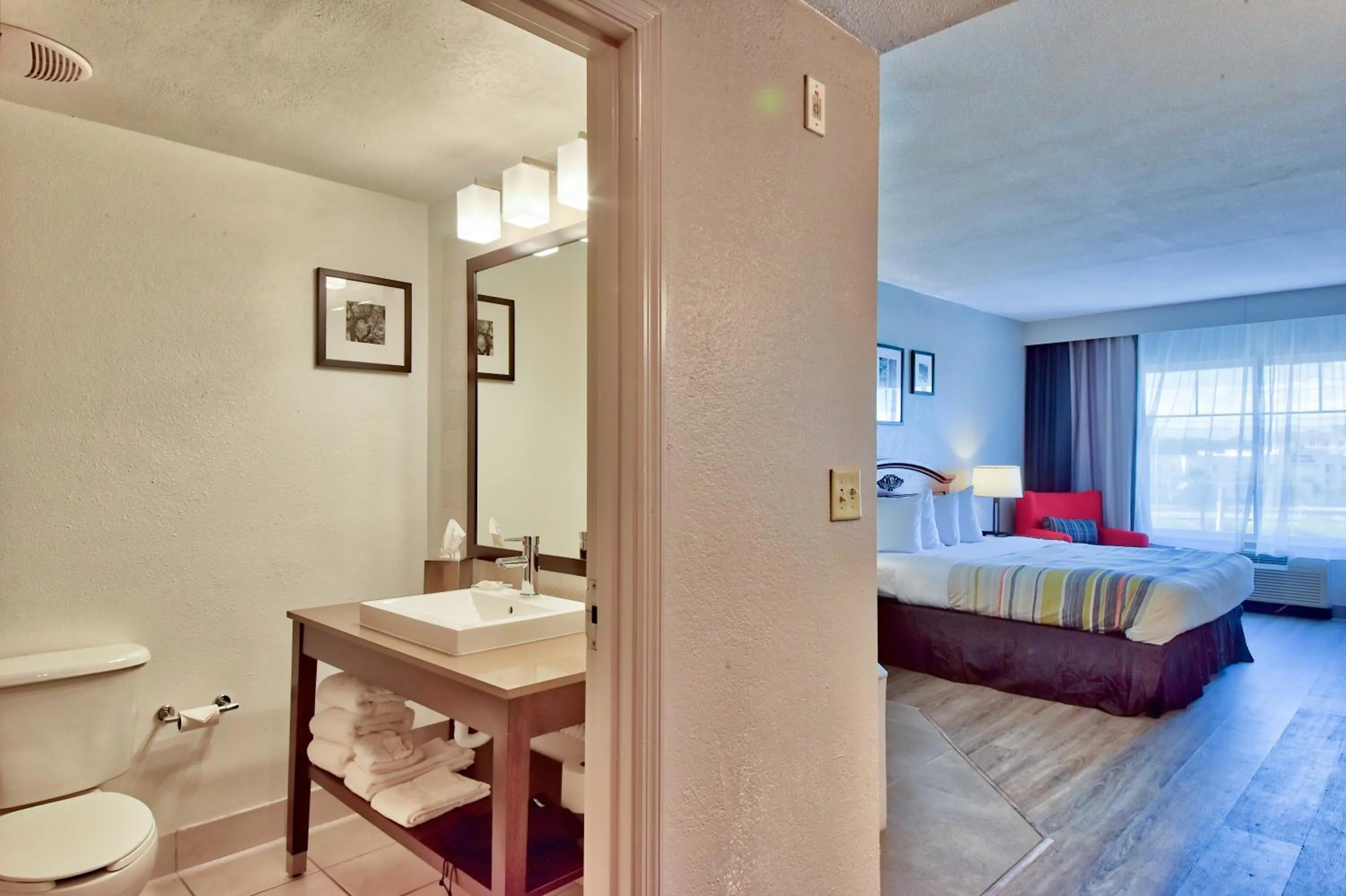 Bed in Country Inn & Suites by Radisson Ocala Southwest