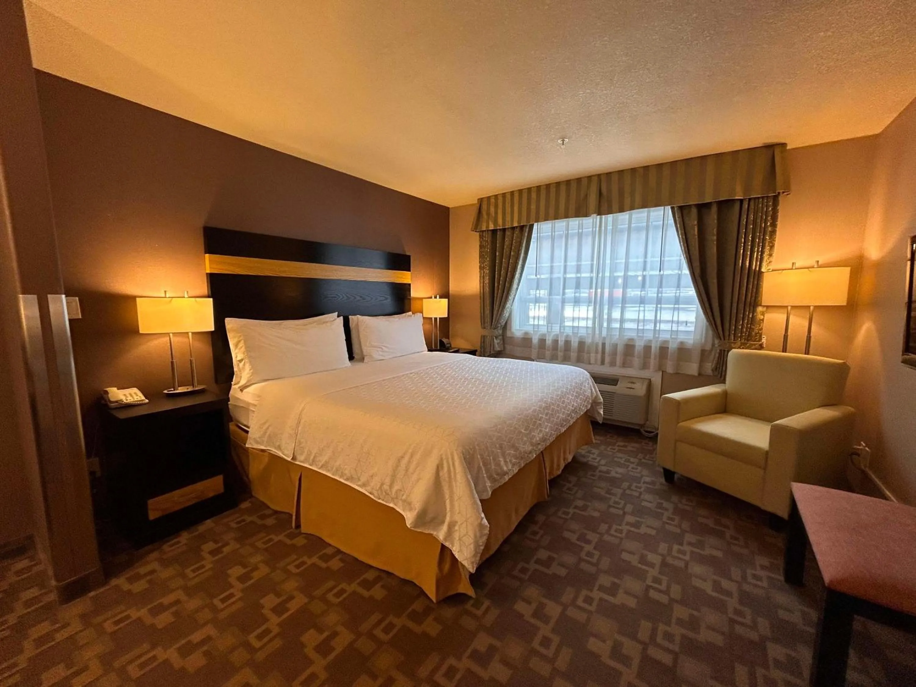 Bedroom, Bed in Holiday Inn Express and Suites Dawson Creek, an IHG Hotel