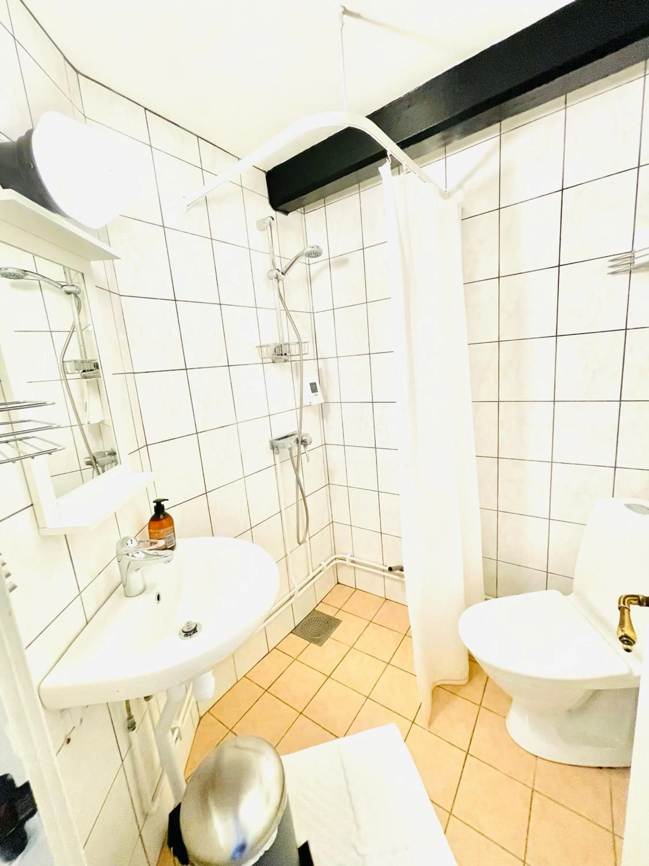 Toilet in Gårdshotellet