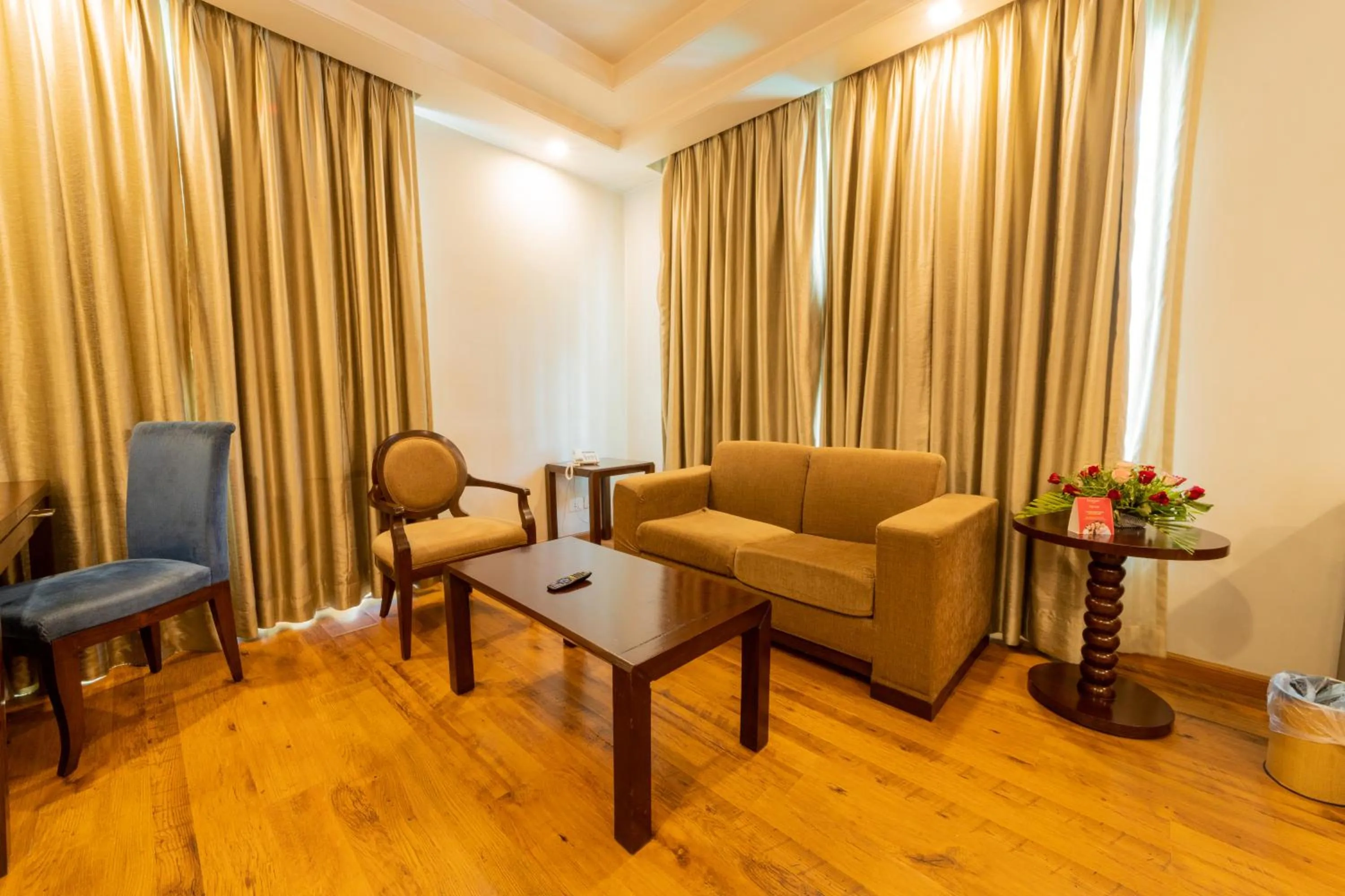 Living room in Ramada By Wyndham Jaipur