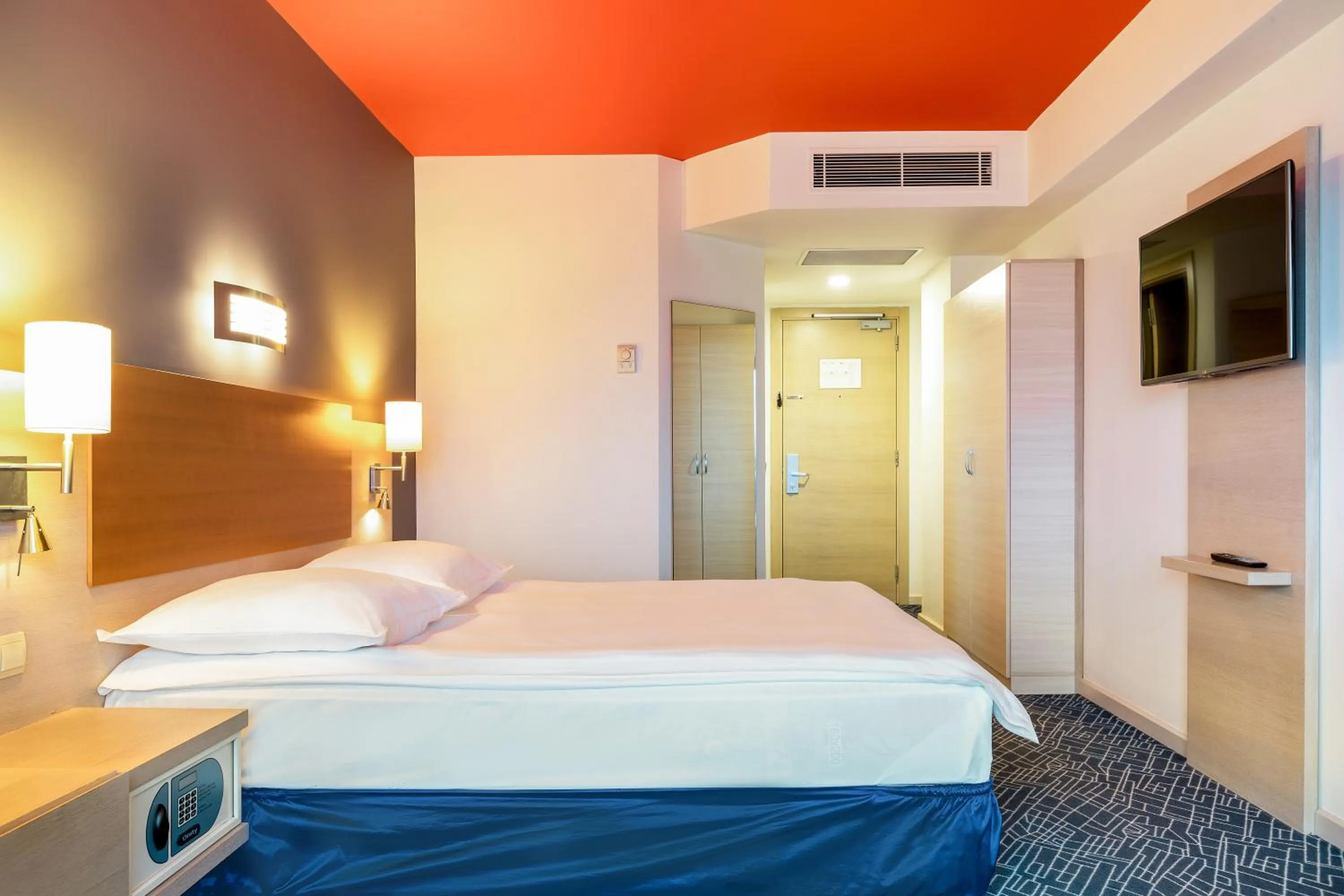 Living room, Bed in Radisson Hotel Baku