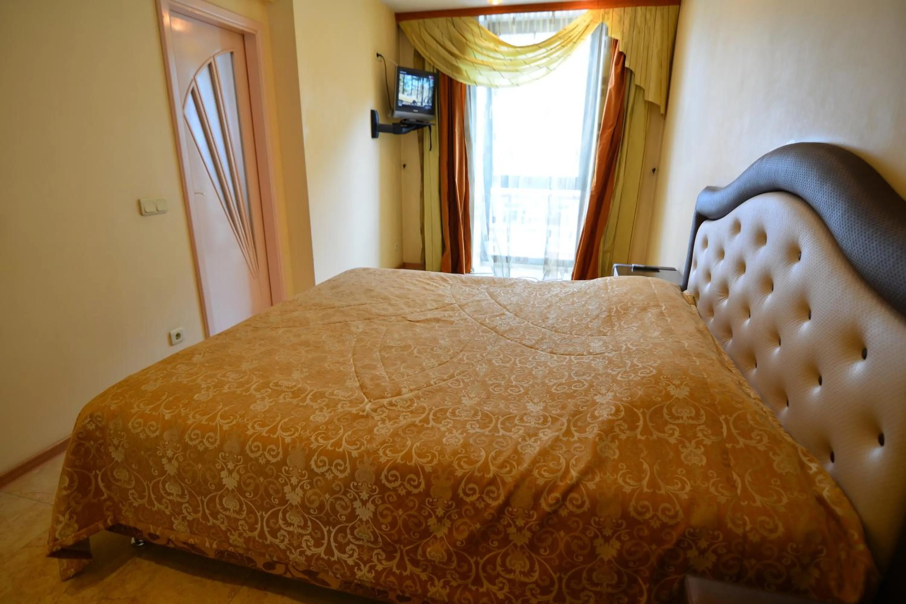 Bed in Prestige apart-hotel