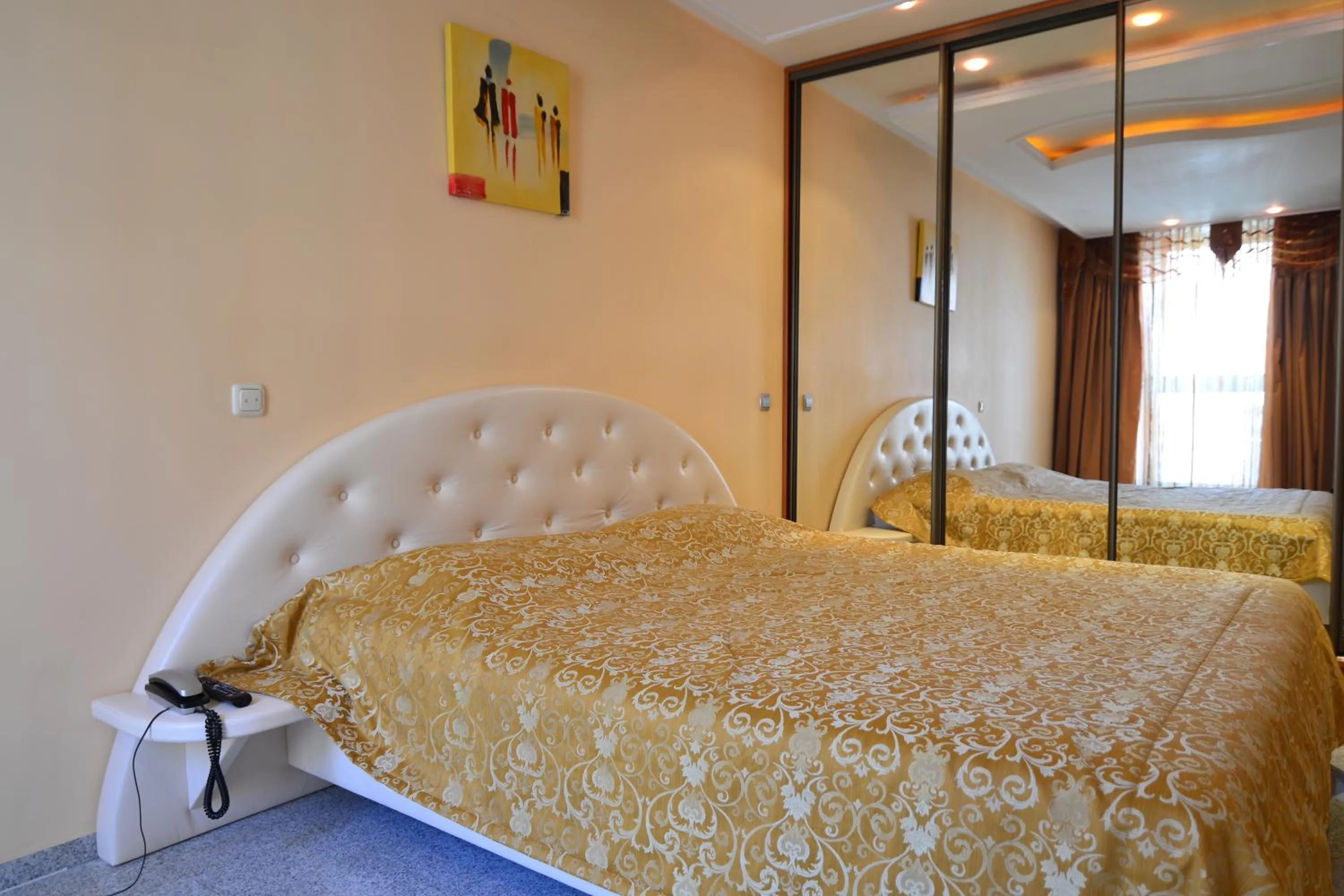Bed in Prestige apart-hotel