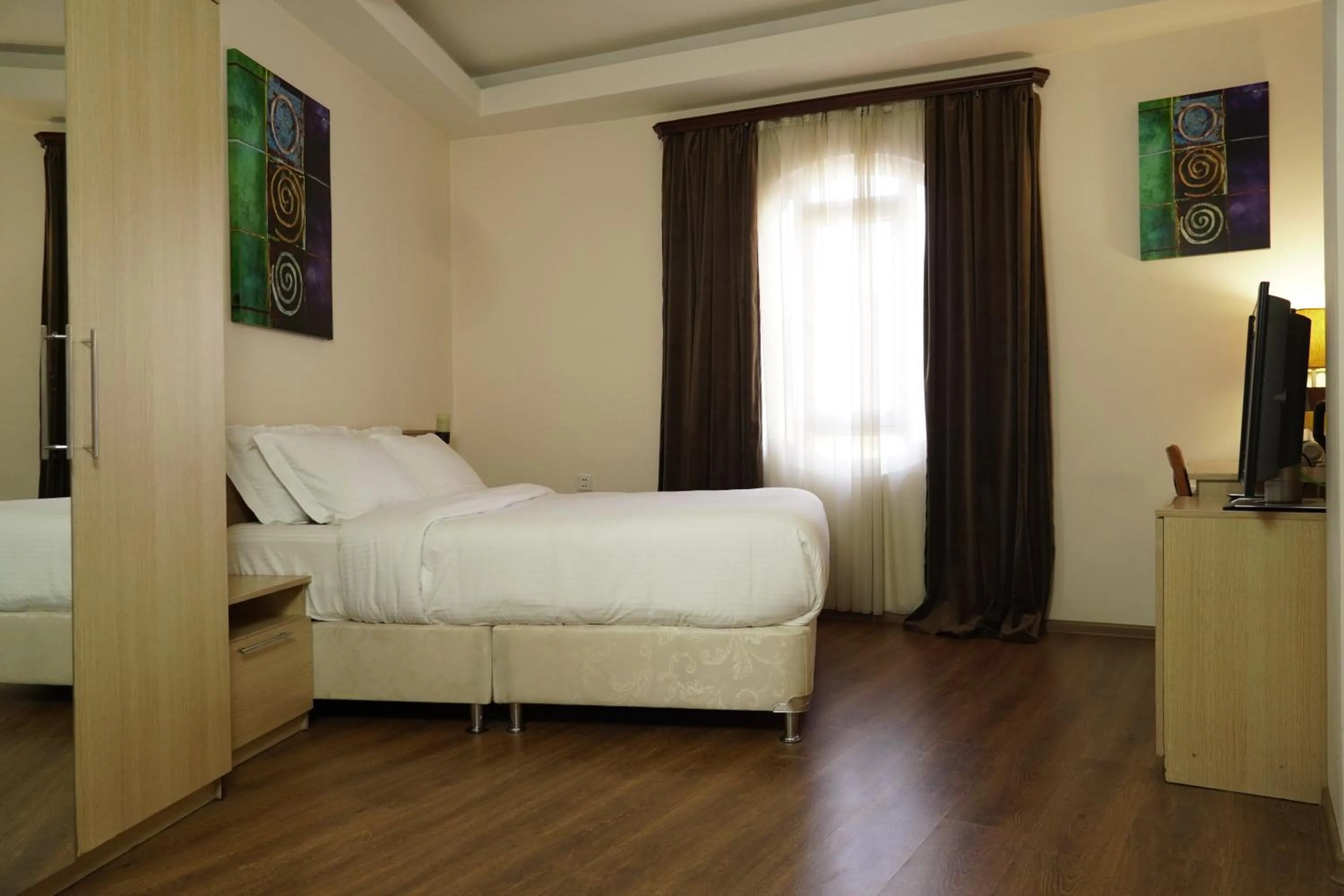 Bed in Aquapark Hotel & Villas