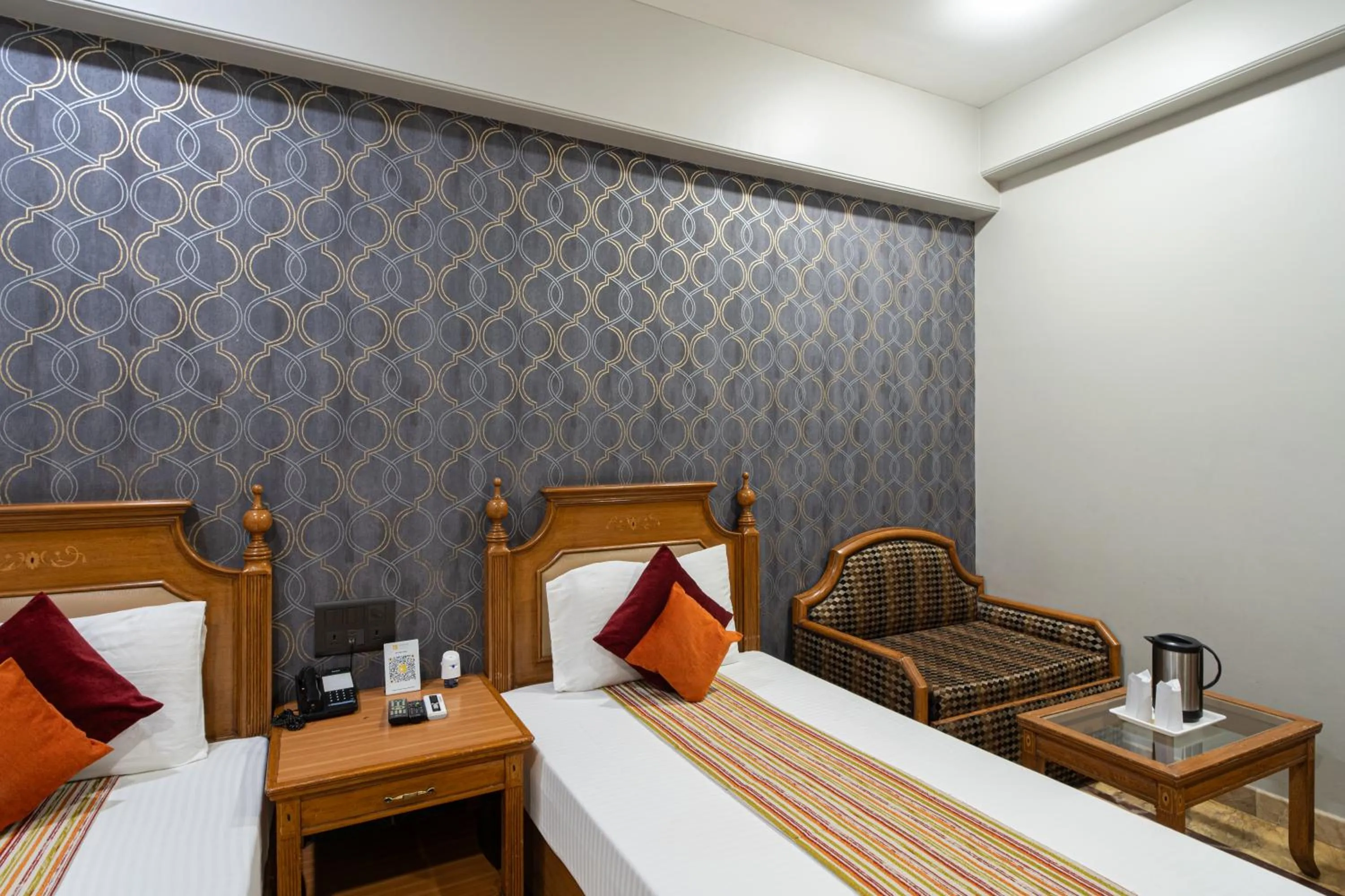 Bed in Hotel Sunstar Grand