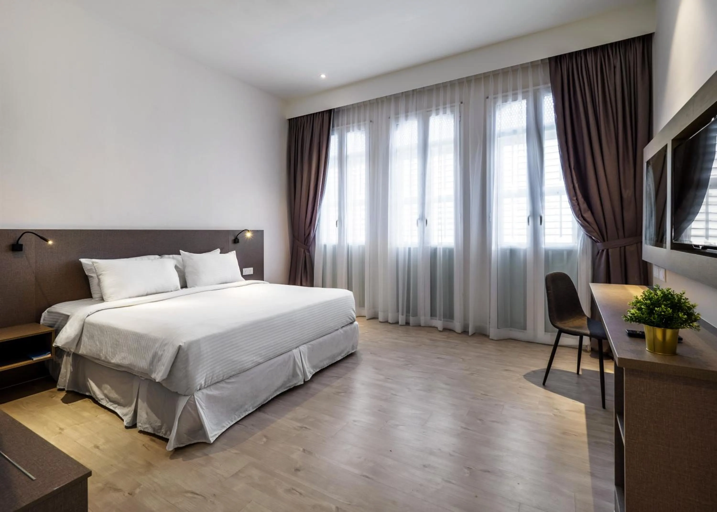 Bed in Hutton Central Hotel Managed by The Ascott Limited