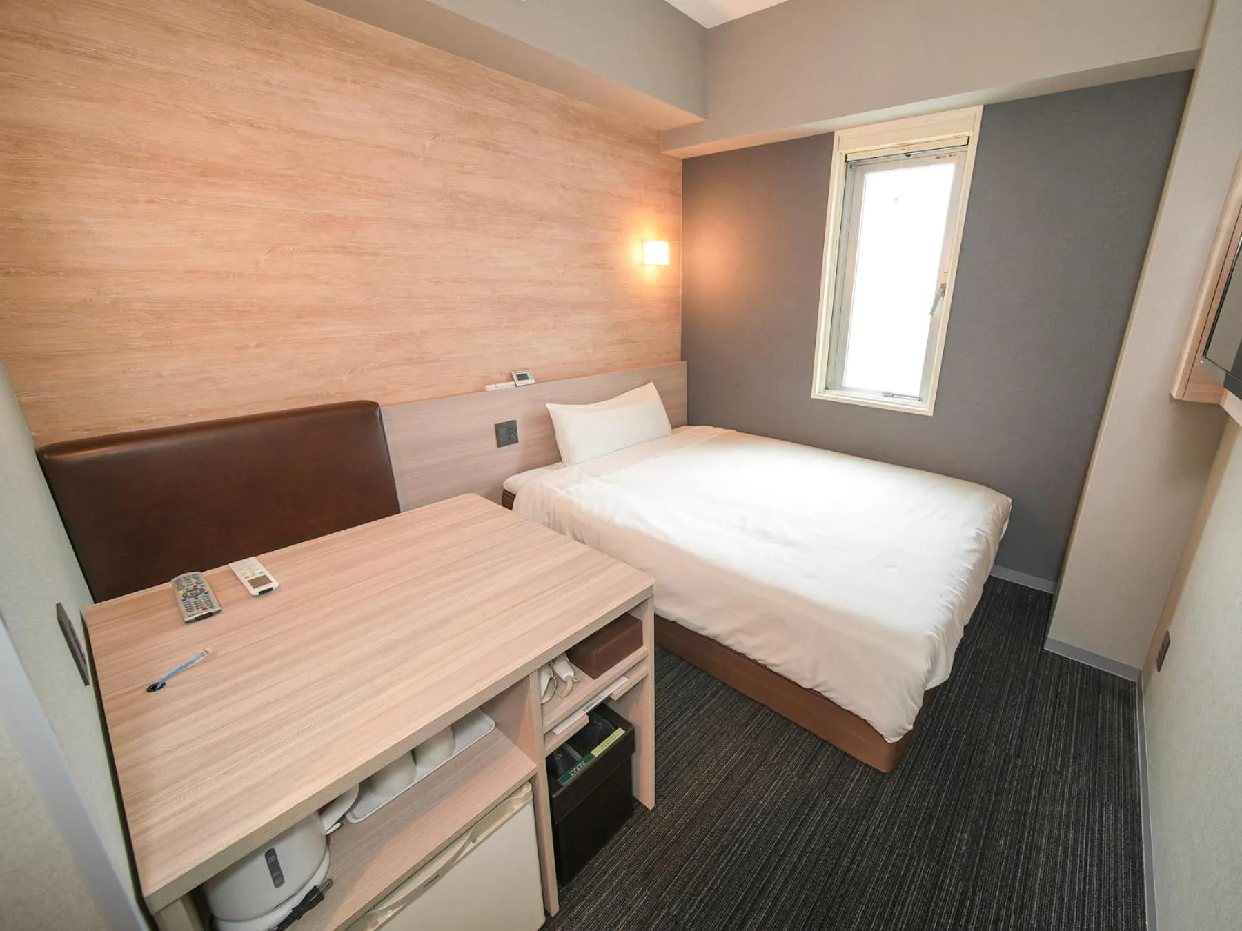 Bed in Super Hotel Kofu Showa Inter