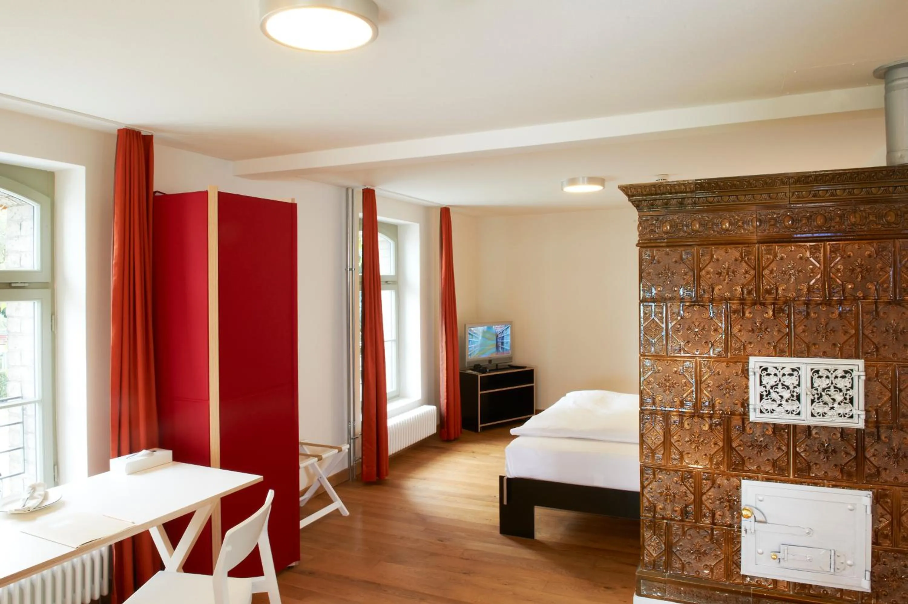 Photo of the whole room, Bed in Boutique-Hotel Auberge Langenthal