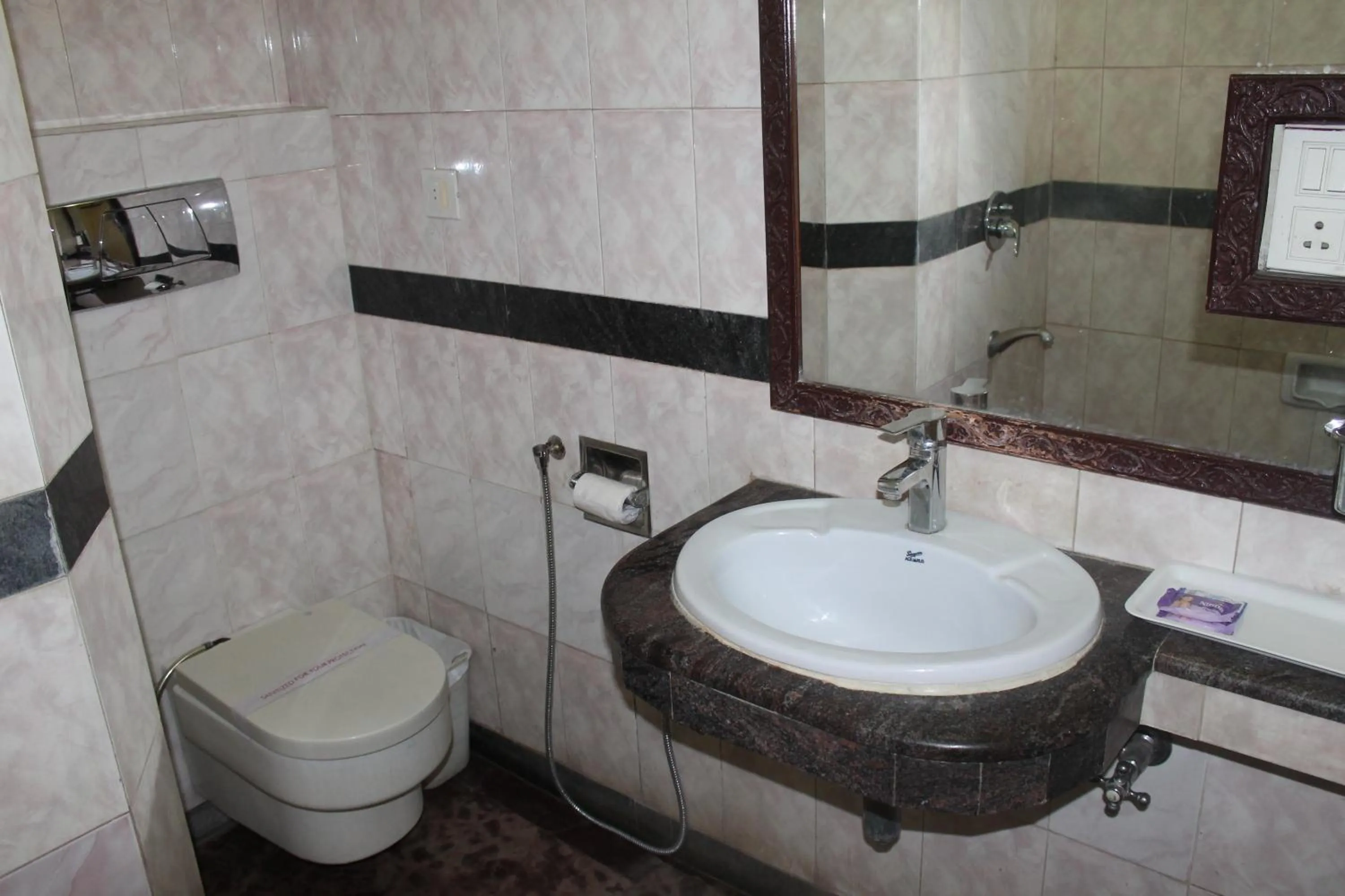 Toilet in Hotel Sunstar Residency