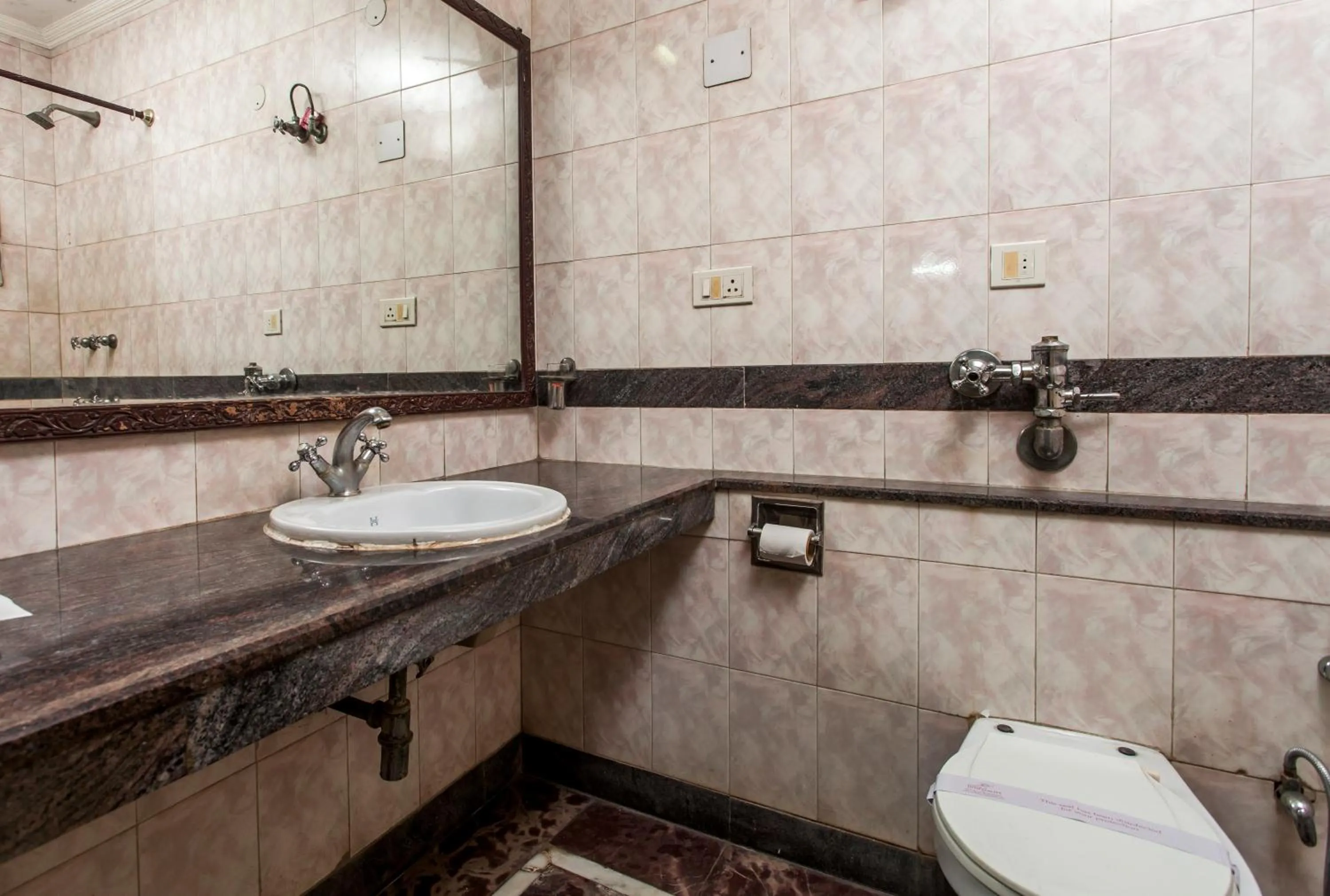 Bathroom in Hotel Sunstar Residency