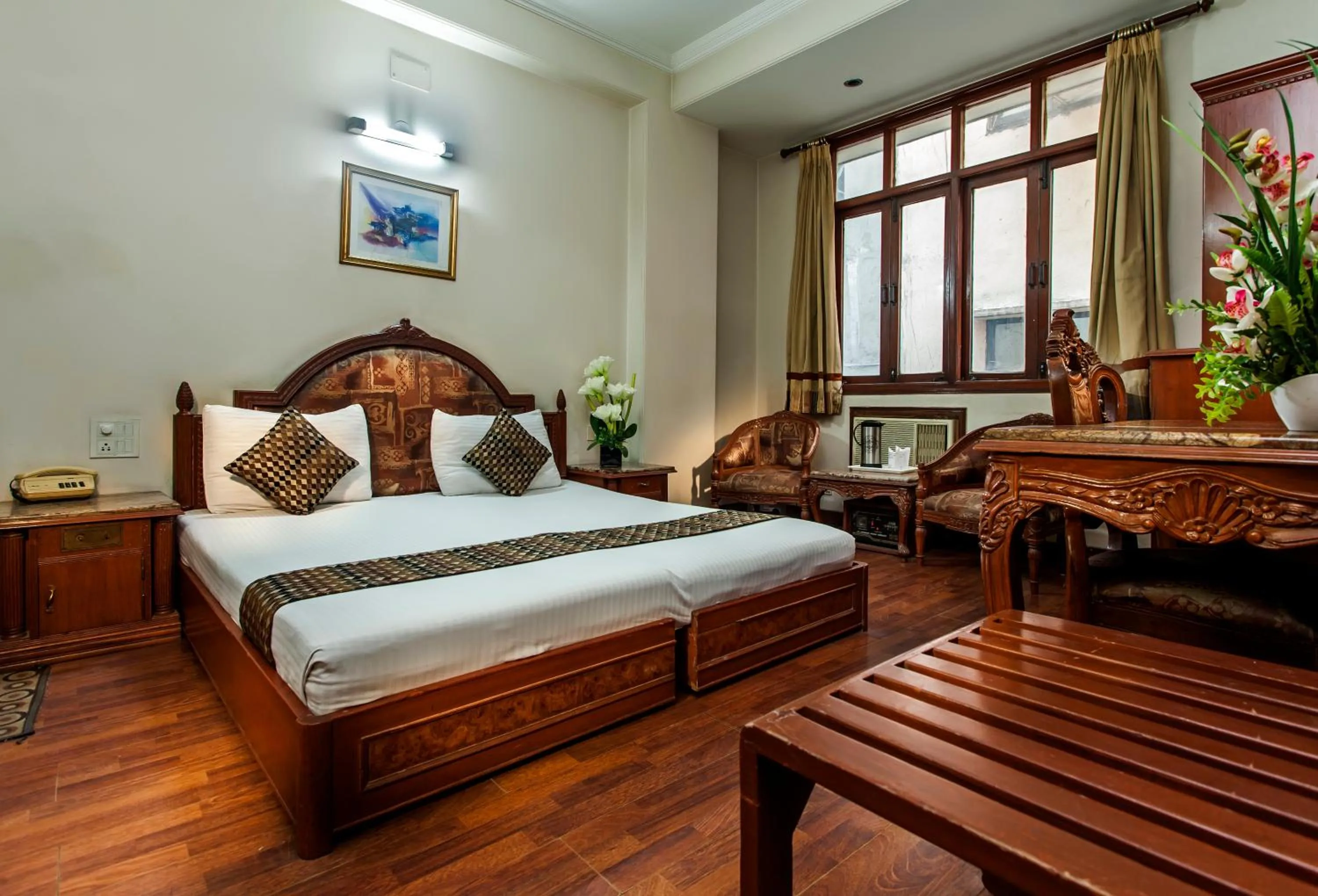 Bedroom, Bed in Hotel Sunstar Residency