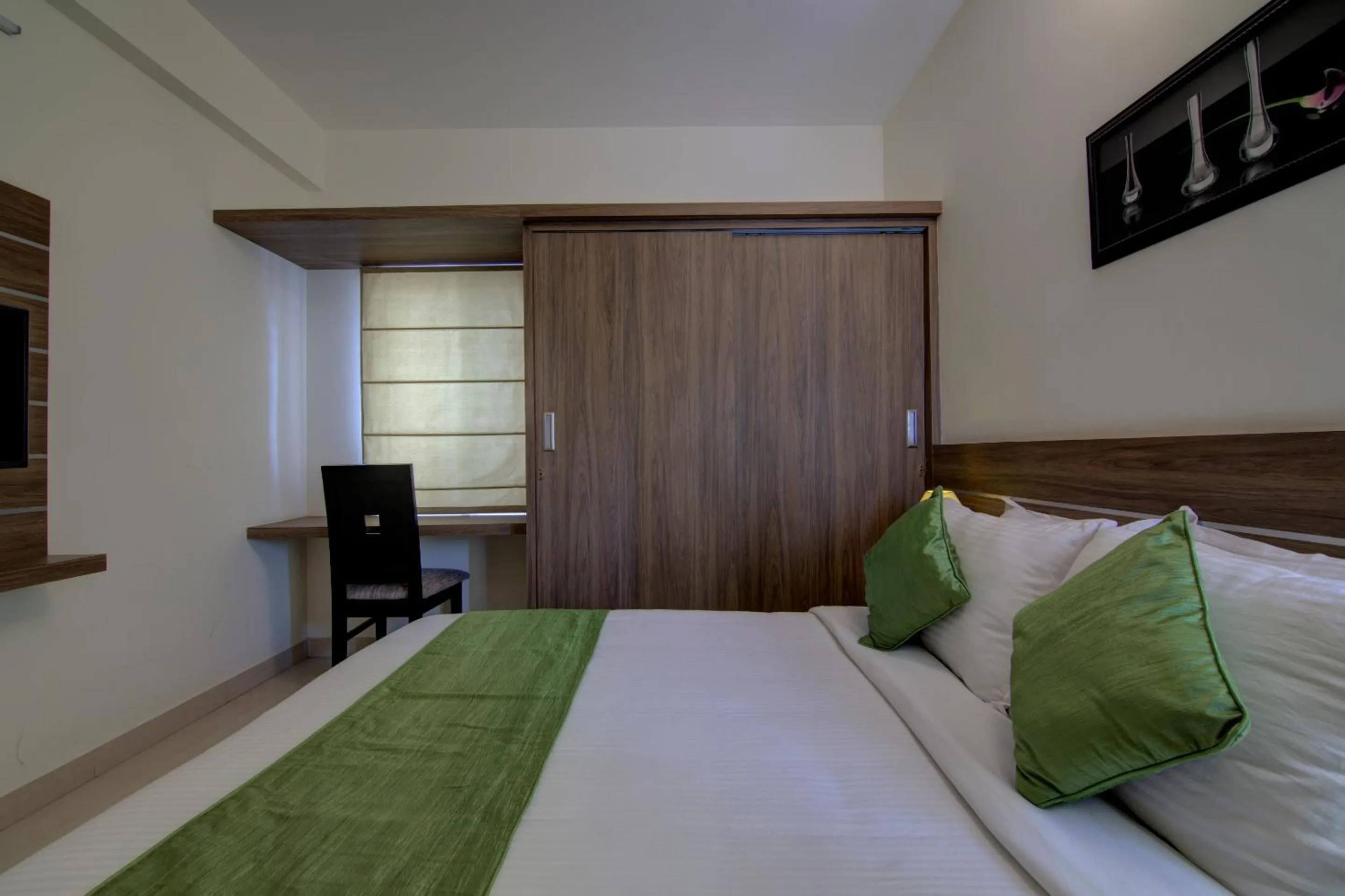 Bed in Sunshine Suites-Premium