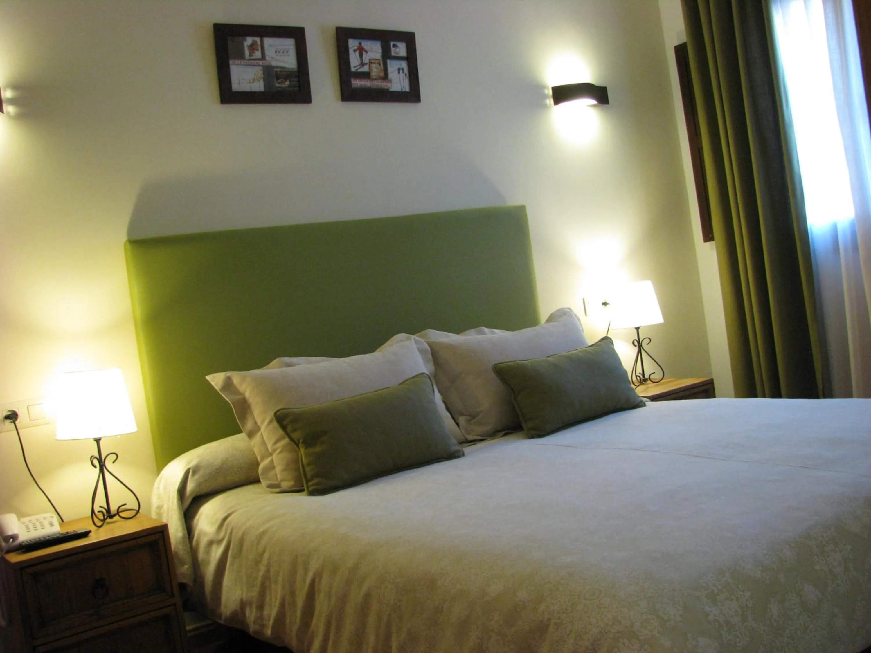 Bed in Aparthotel Sarrato