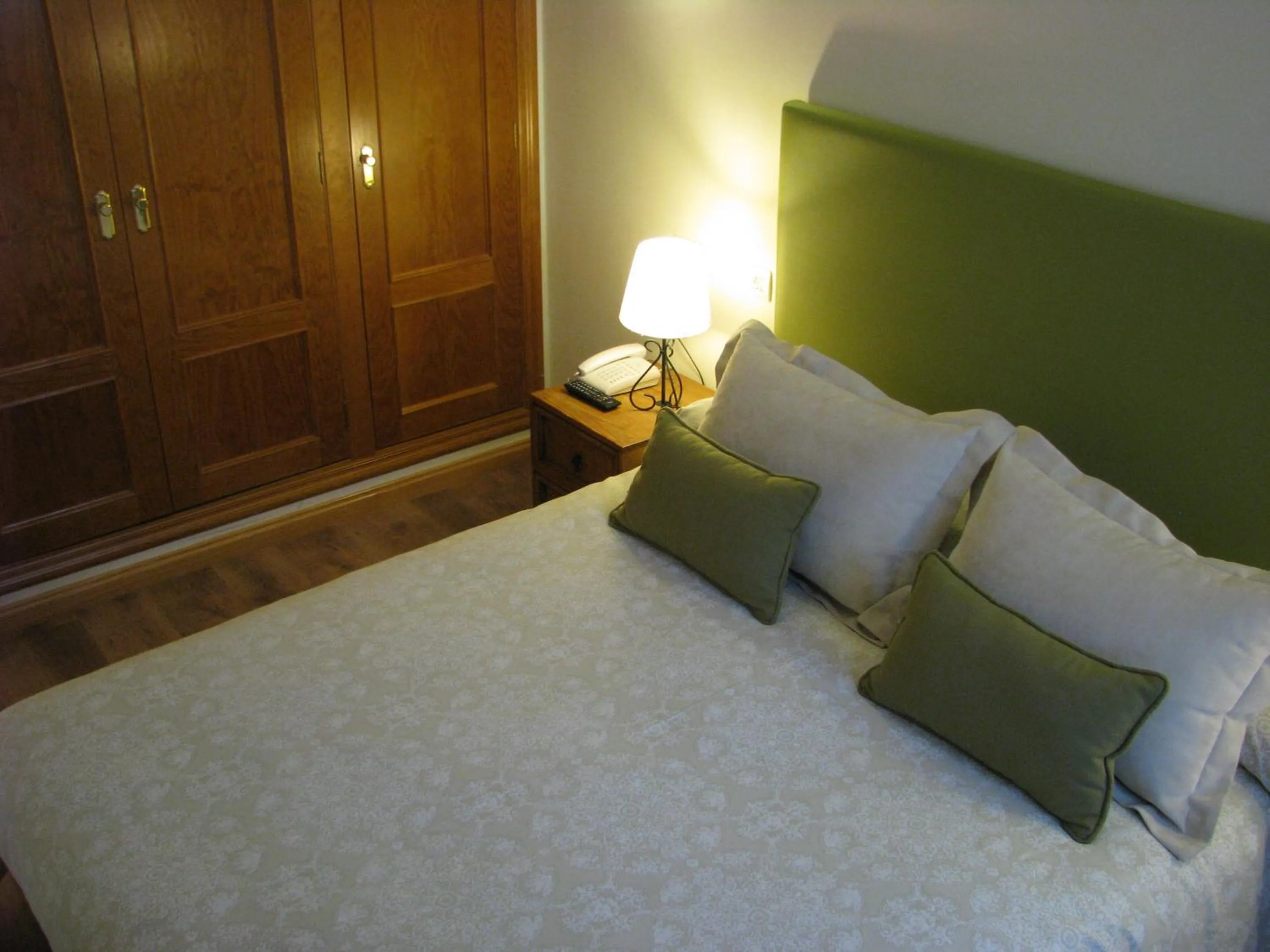 Bed in Aparthotel Sarrato