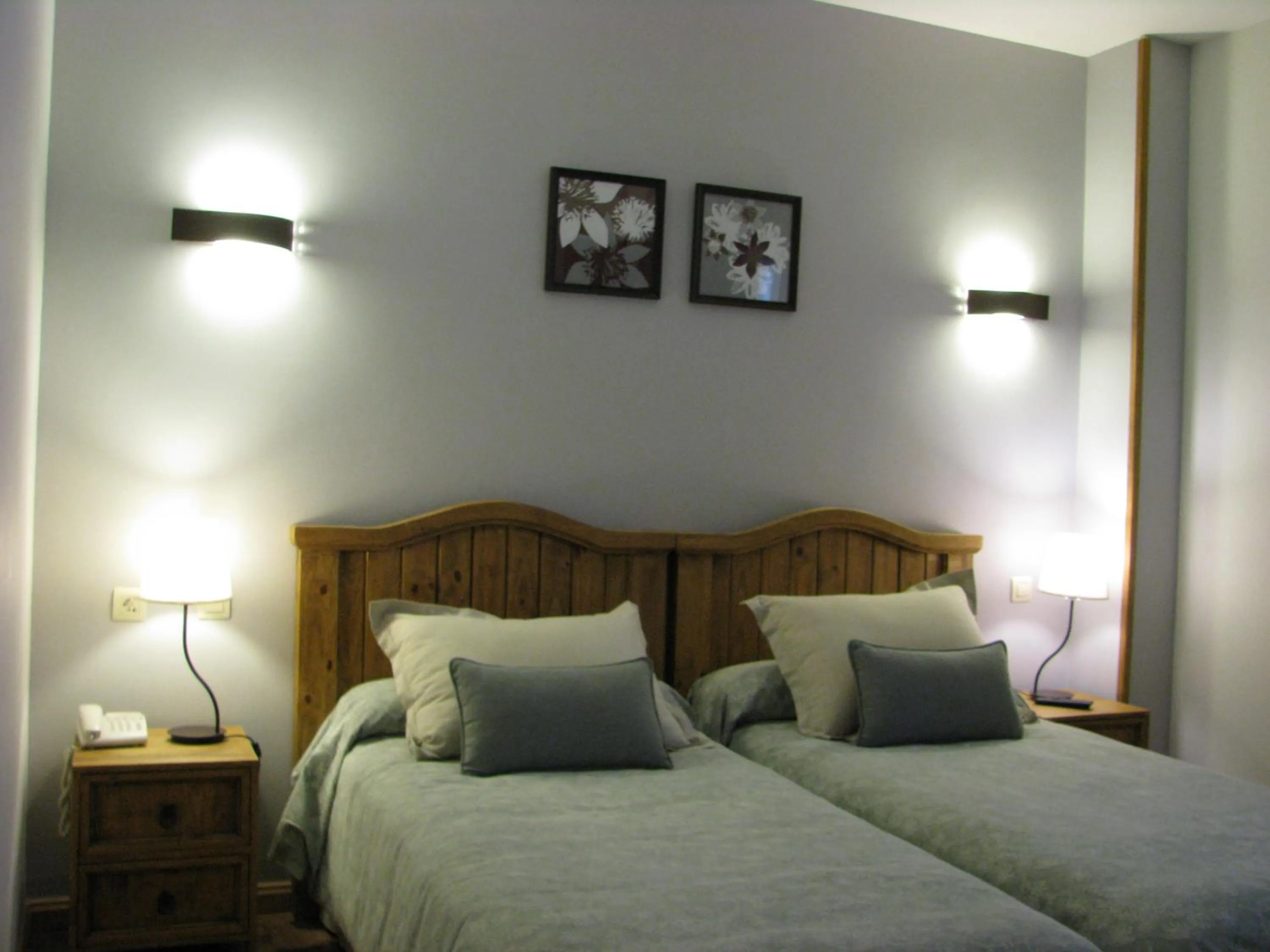 Bed in Aparthotel Sarrato