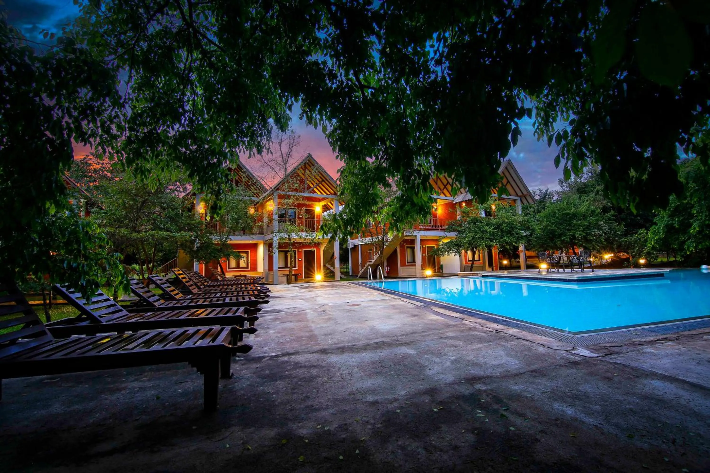 Swimming pool in Elephas Resort & Spa