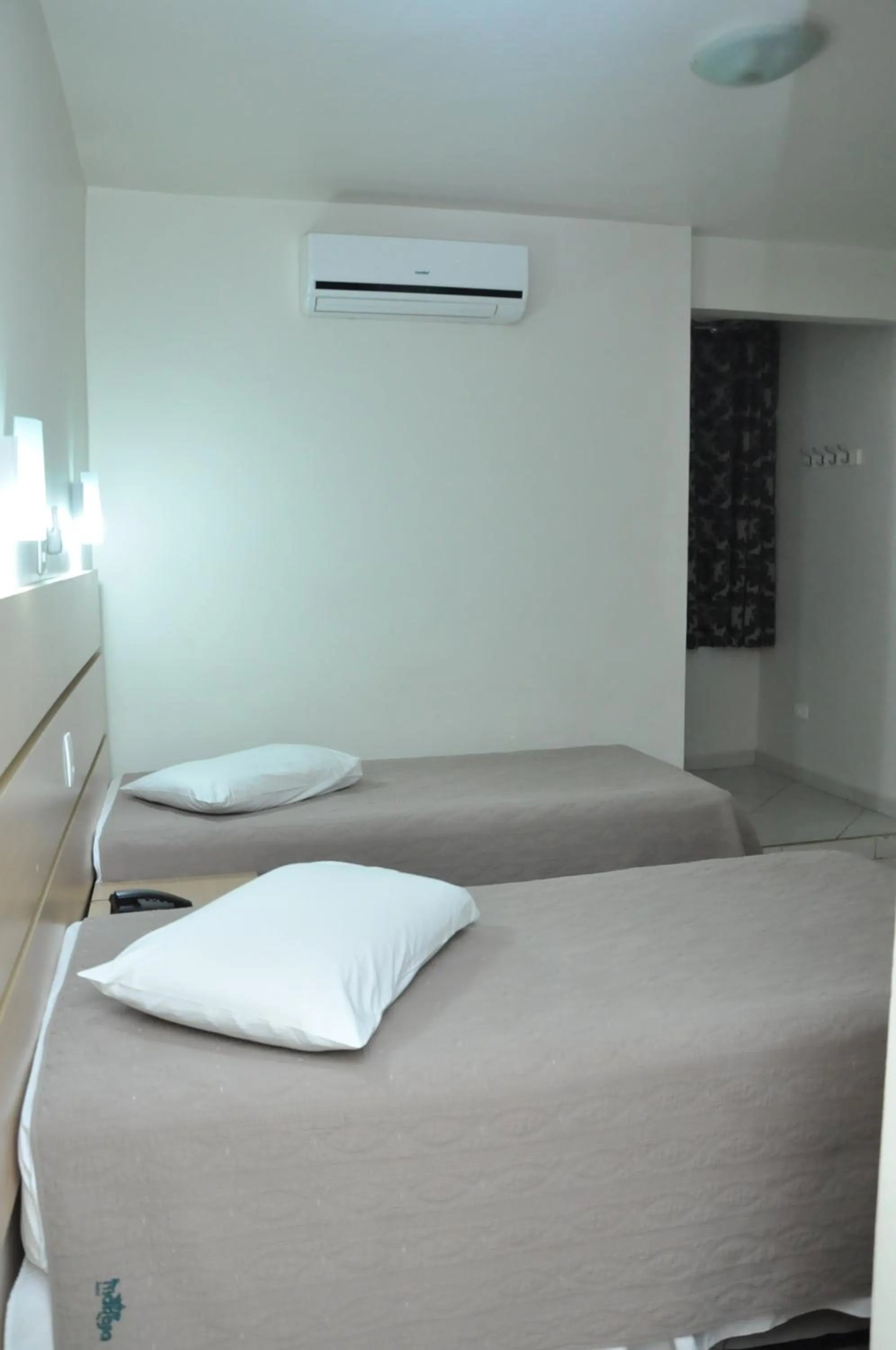 Bed in Hotel Marajó