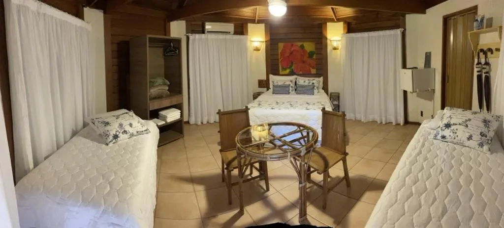 Bed in Pousada Vitorino