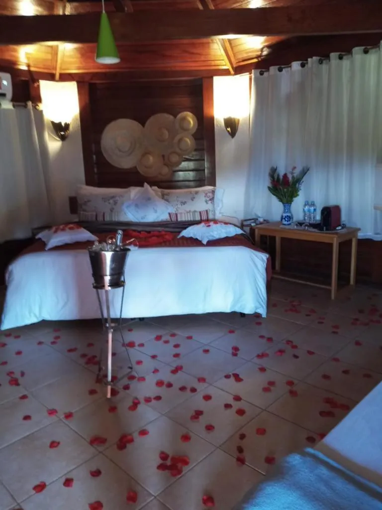 Bed in Pousada Vitorino