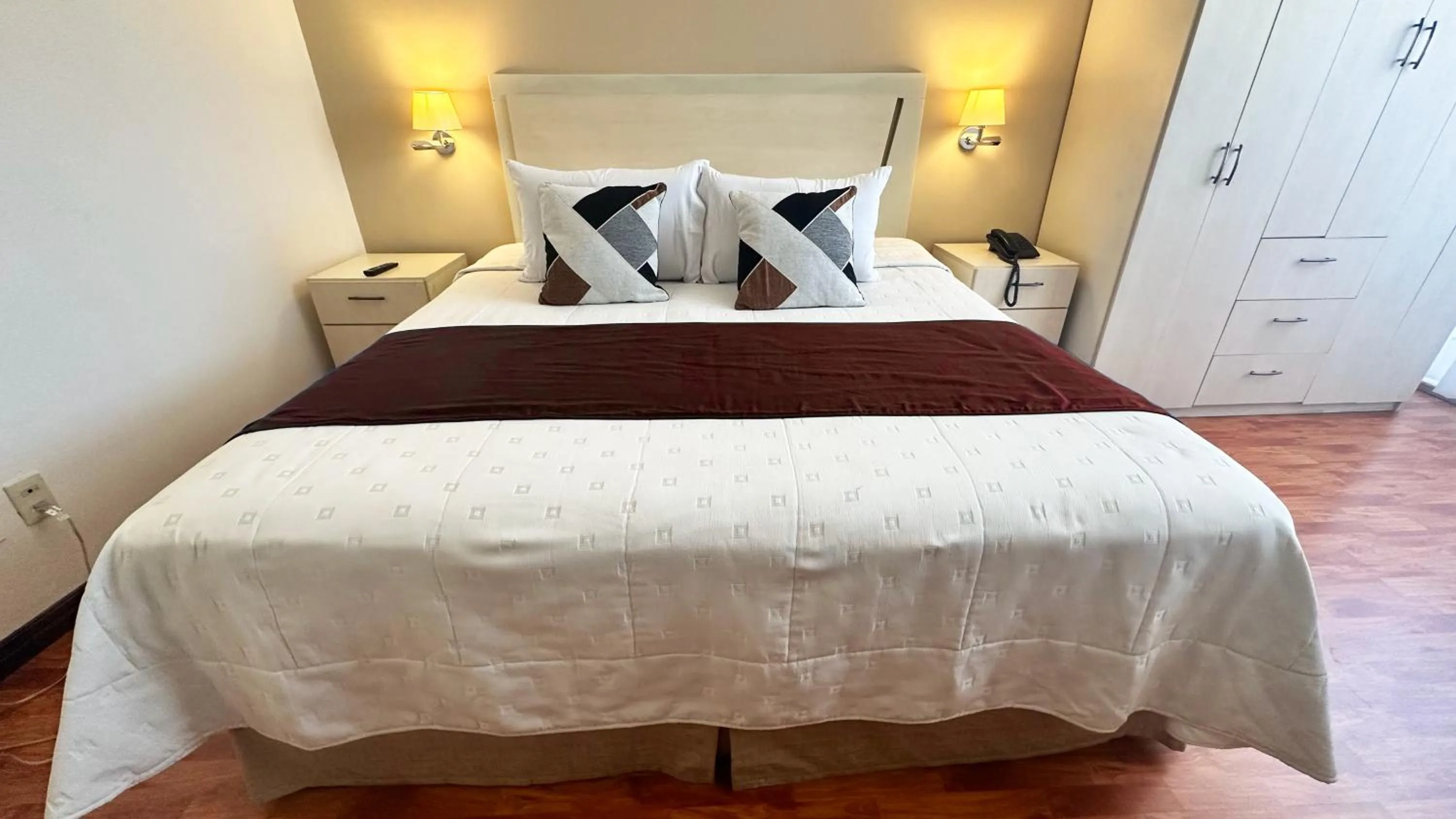 Bed in Delfines Apart Hotel