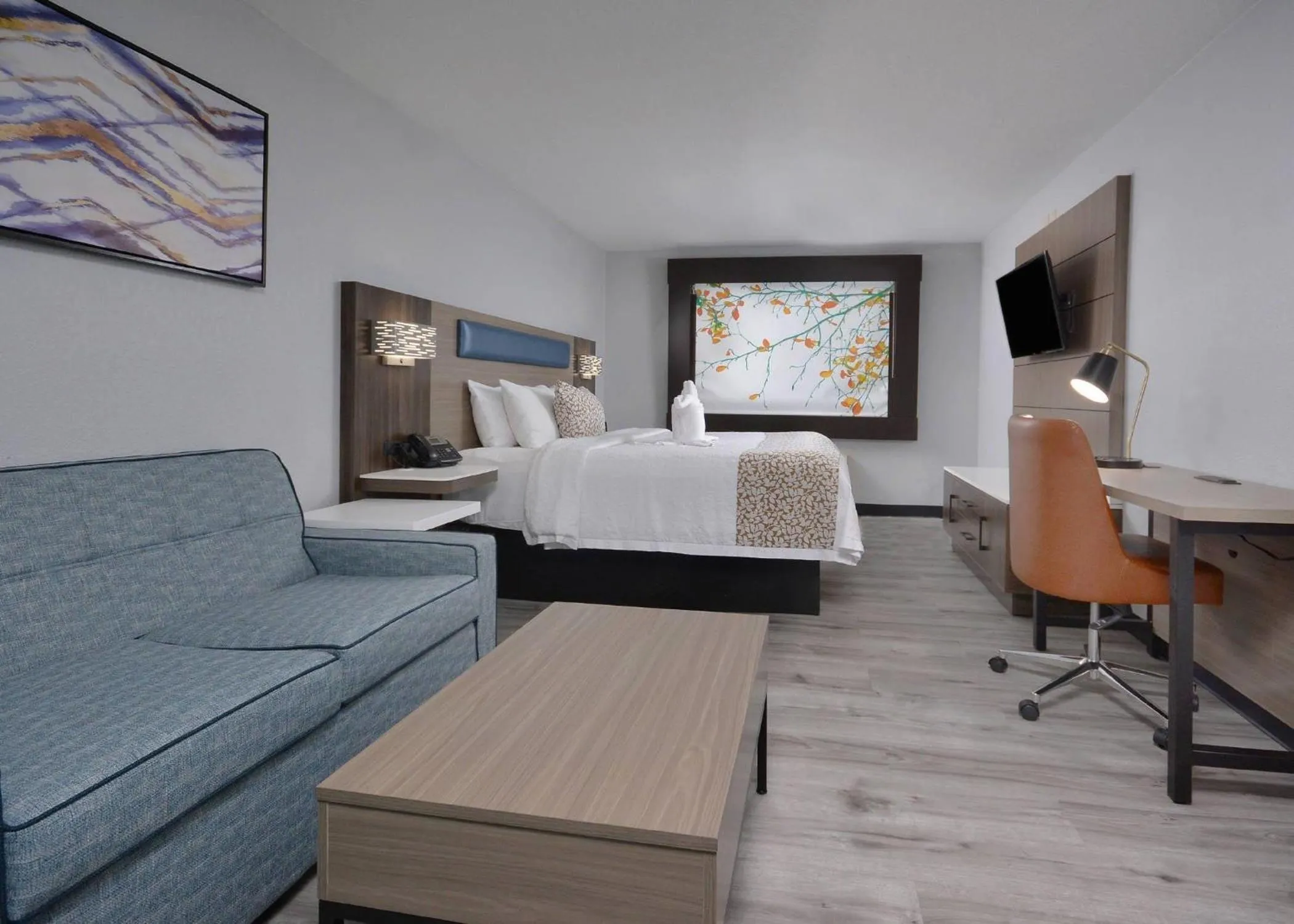 Bedroom, Bed in Brookstone Lodge near Biltmore Village, an Ascend Collection Hotel