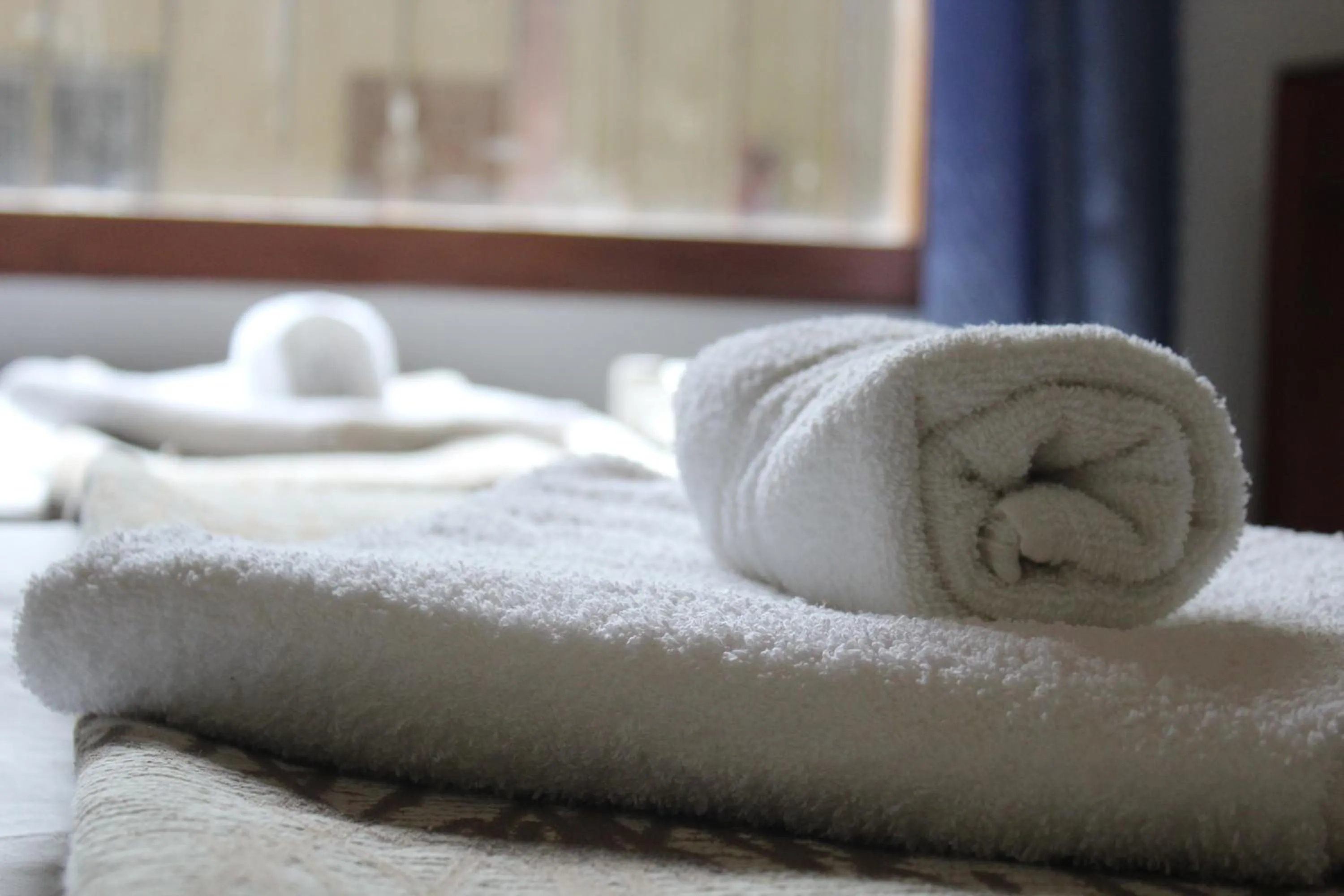 towels, Bed in Palo Rosa Lodge