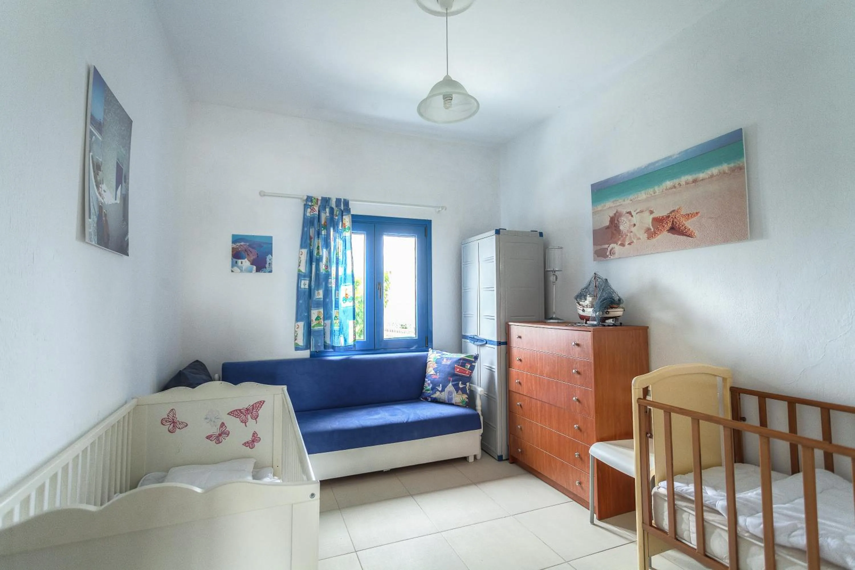 Bed in Navy Greece Villa with swimming pool & sea view