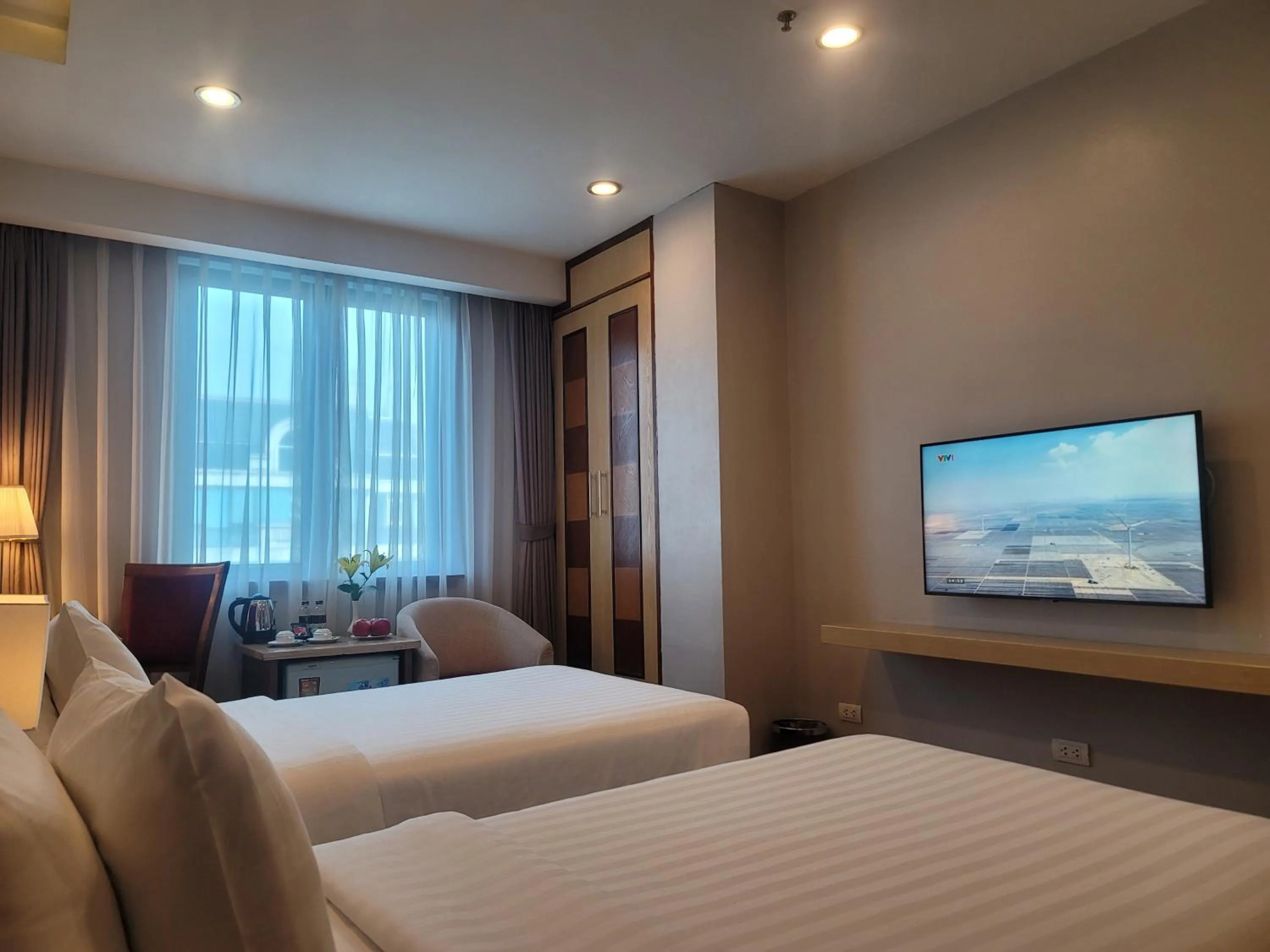 TV and multimedia, Bed in Luxeden Hotel Hanoi