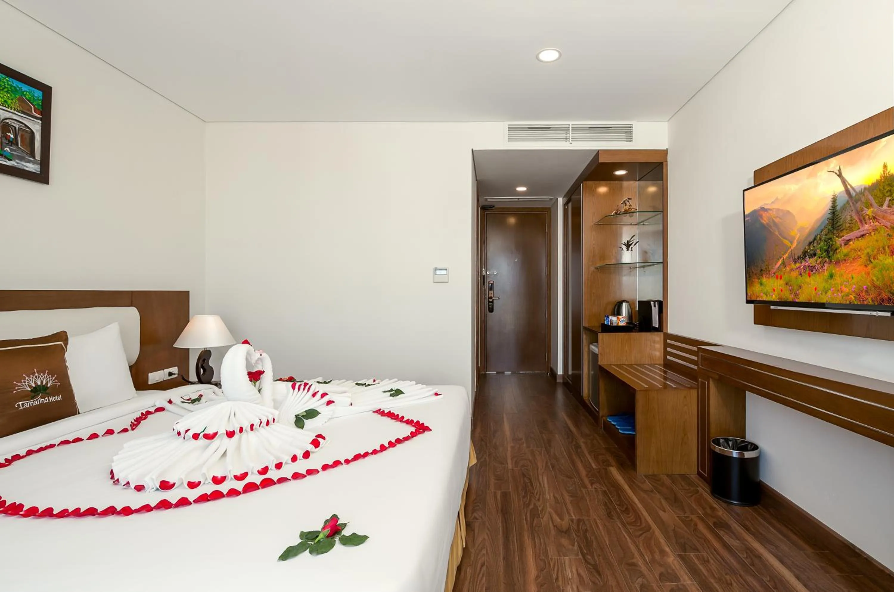 Bed in Tamarind Danang Beach Hotel