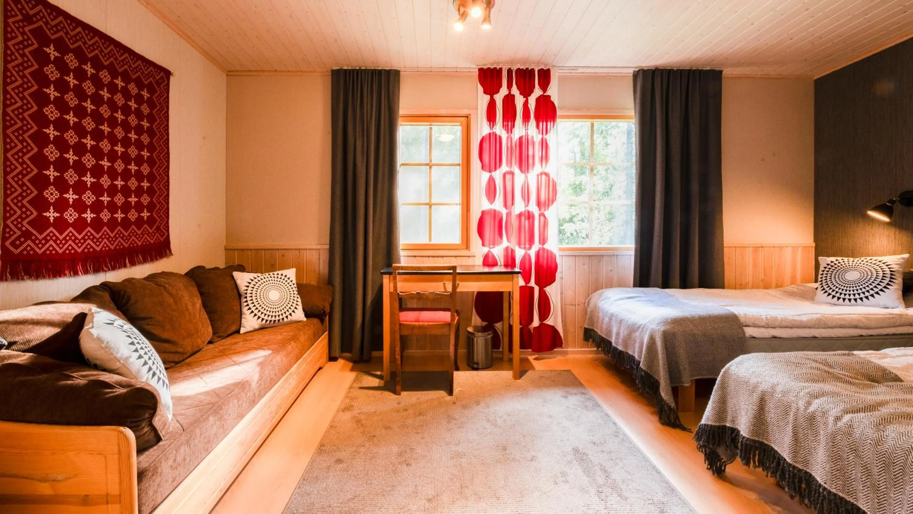 Bed in Isokenkäisten Klubi - Wilderness Lodge