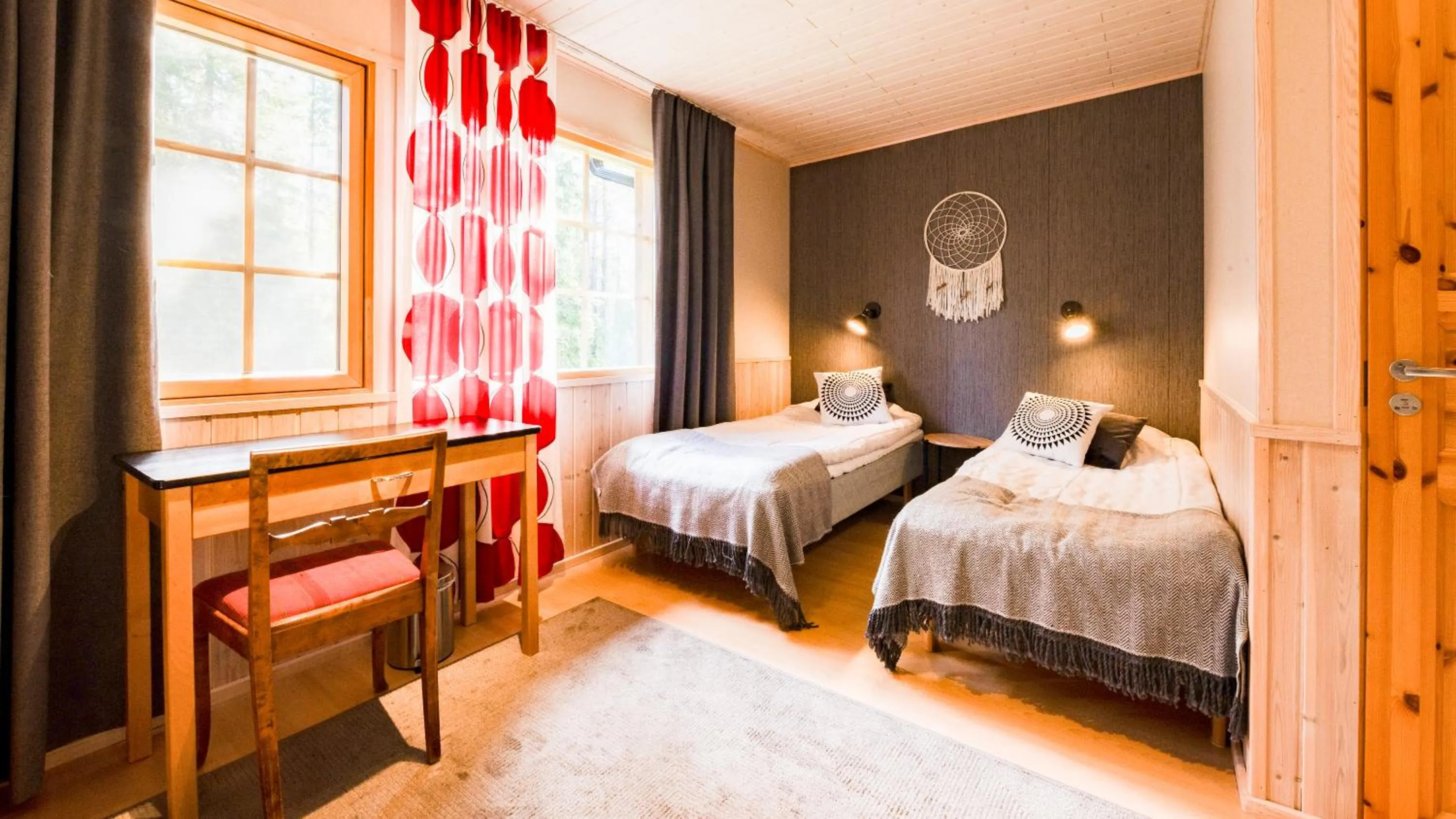 Bed in Isokenkäisten Klubi - Wilderness Lodge